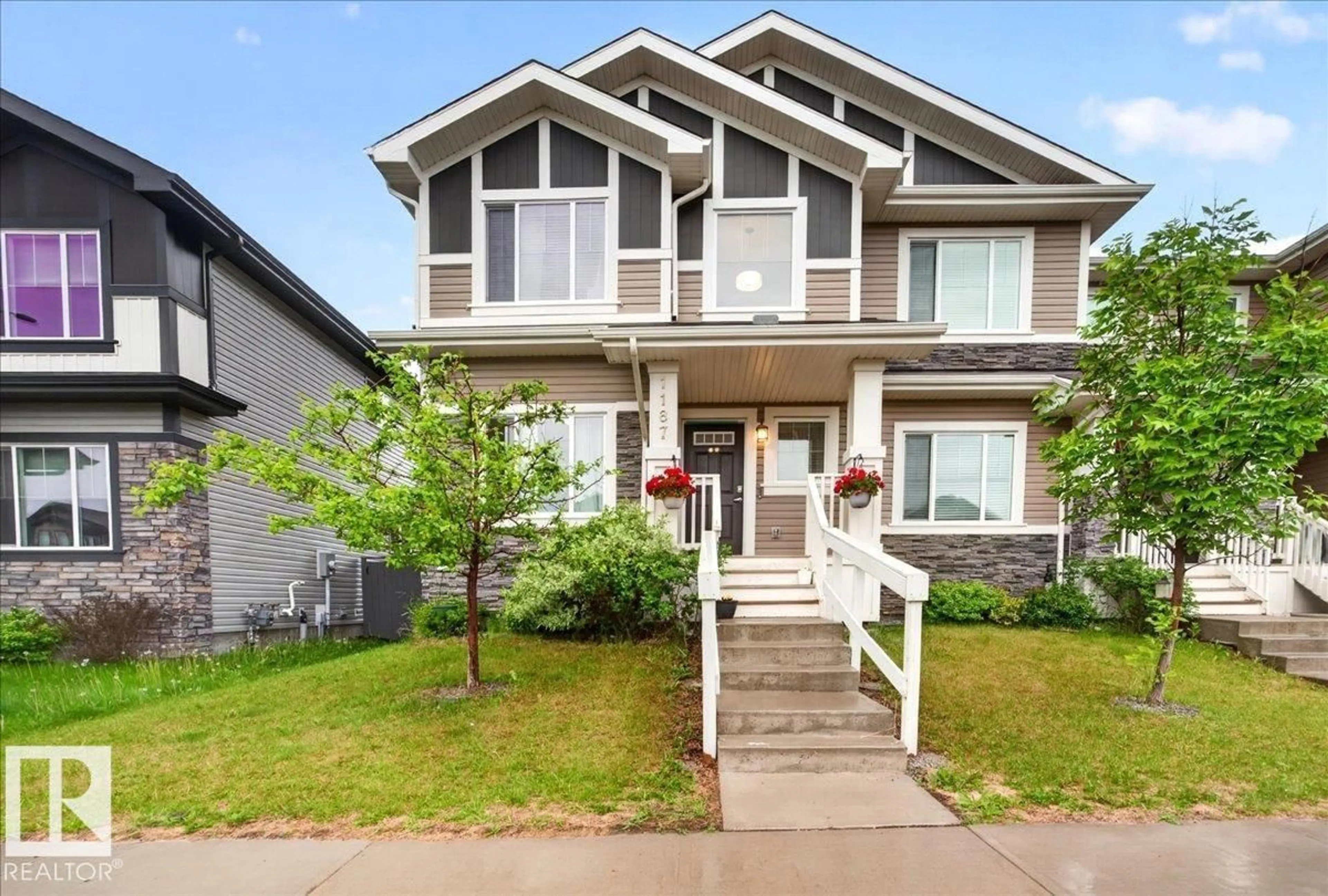 Home with vinyl exterior material, street for 1187 CY BECKER RD, Edmonton Alberta T5Y3V9