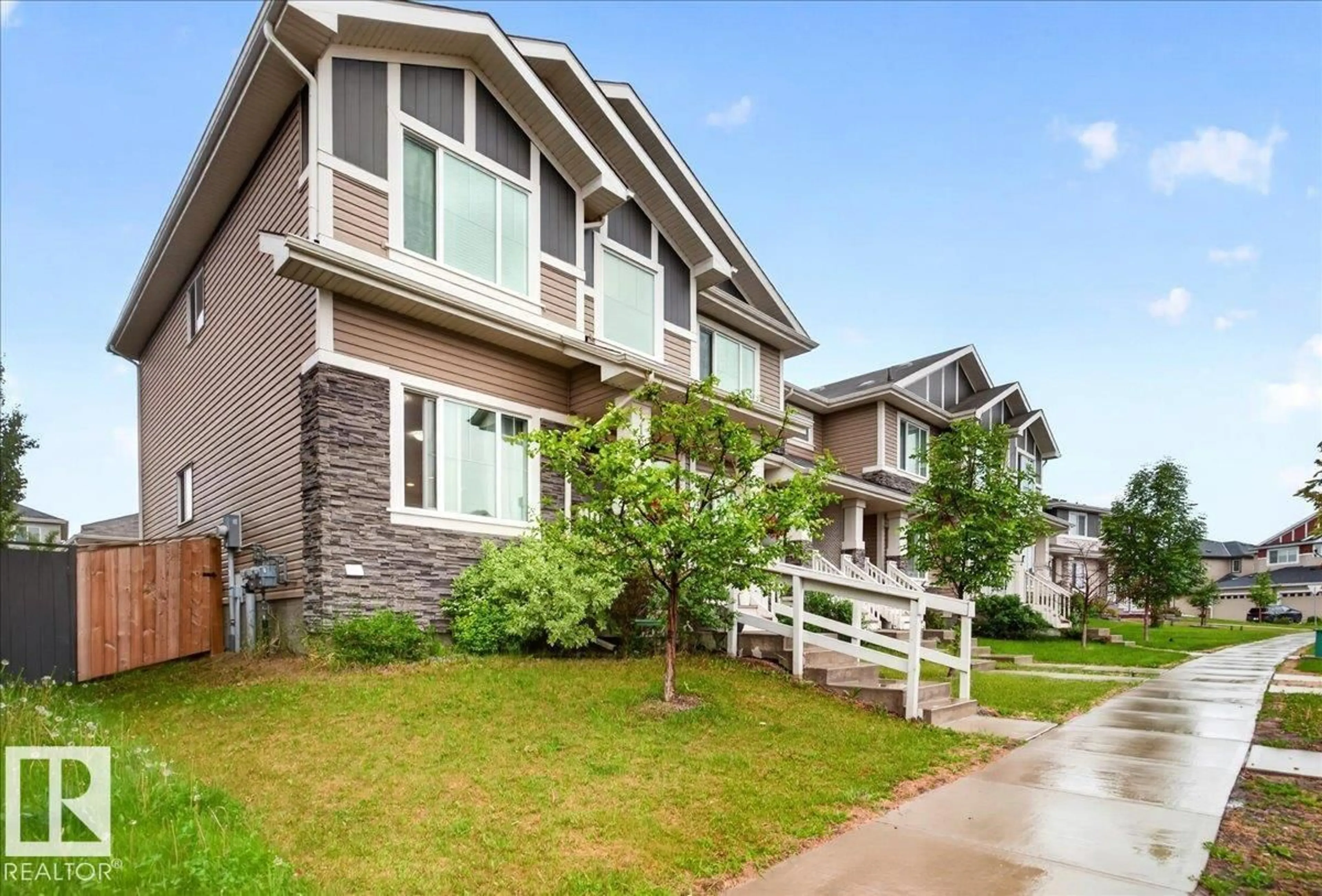 Home with vinyl exterior material, street for 1187 CY BECKER RD, Edmonton Alberta T5Y3V9