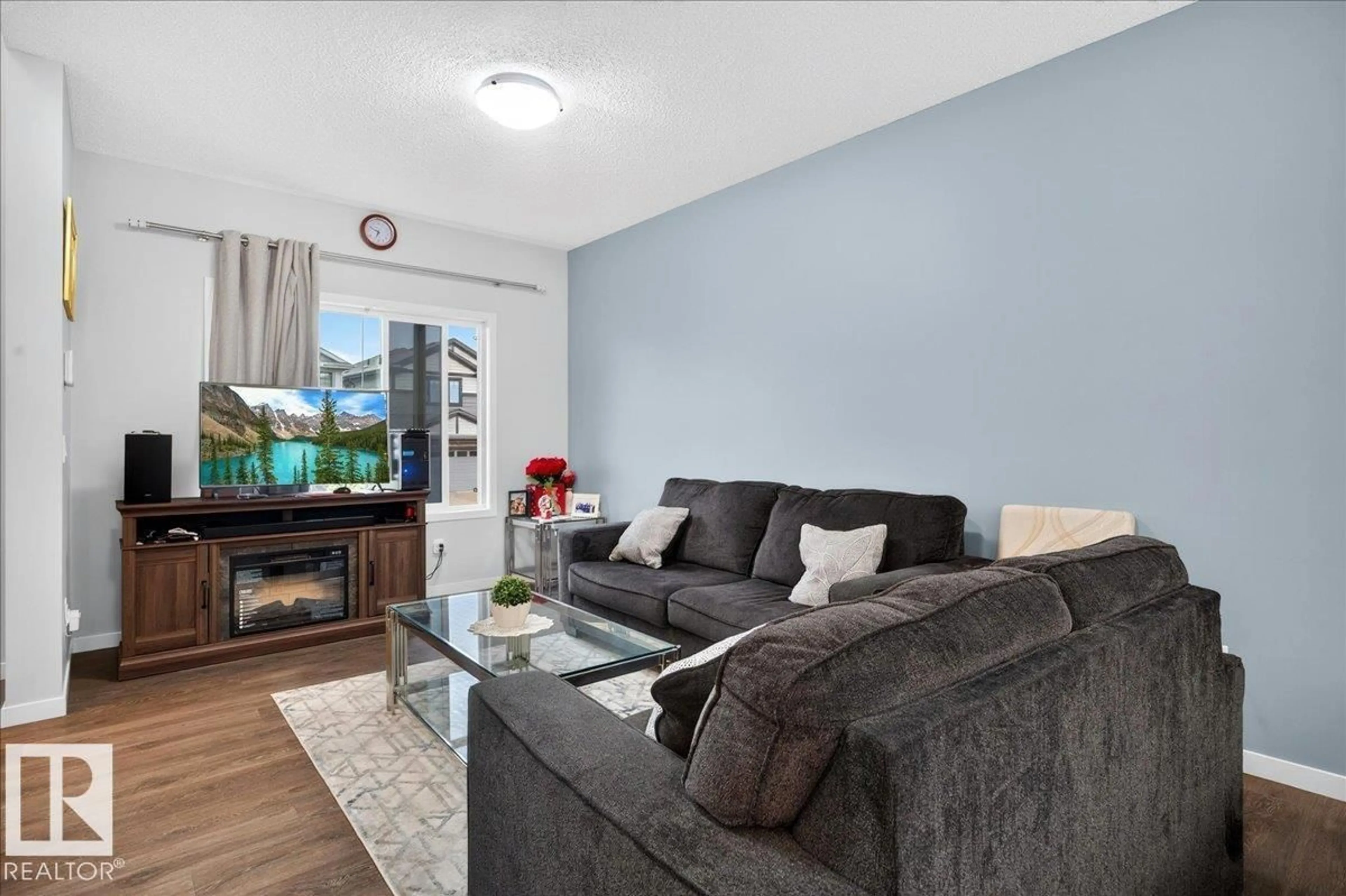 Living room with furniture, unknown for 1187 CY BECKER RD, Edmonton Alberta T5Y3V9