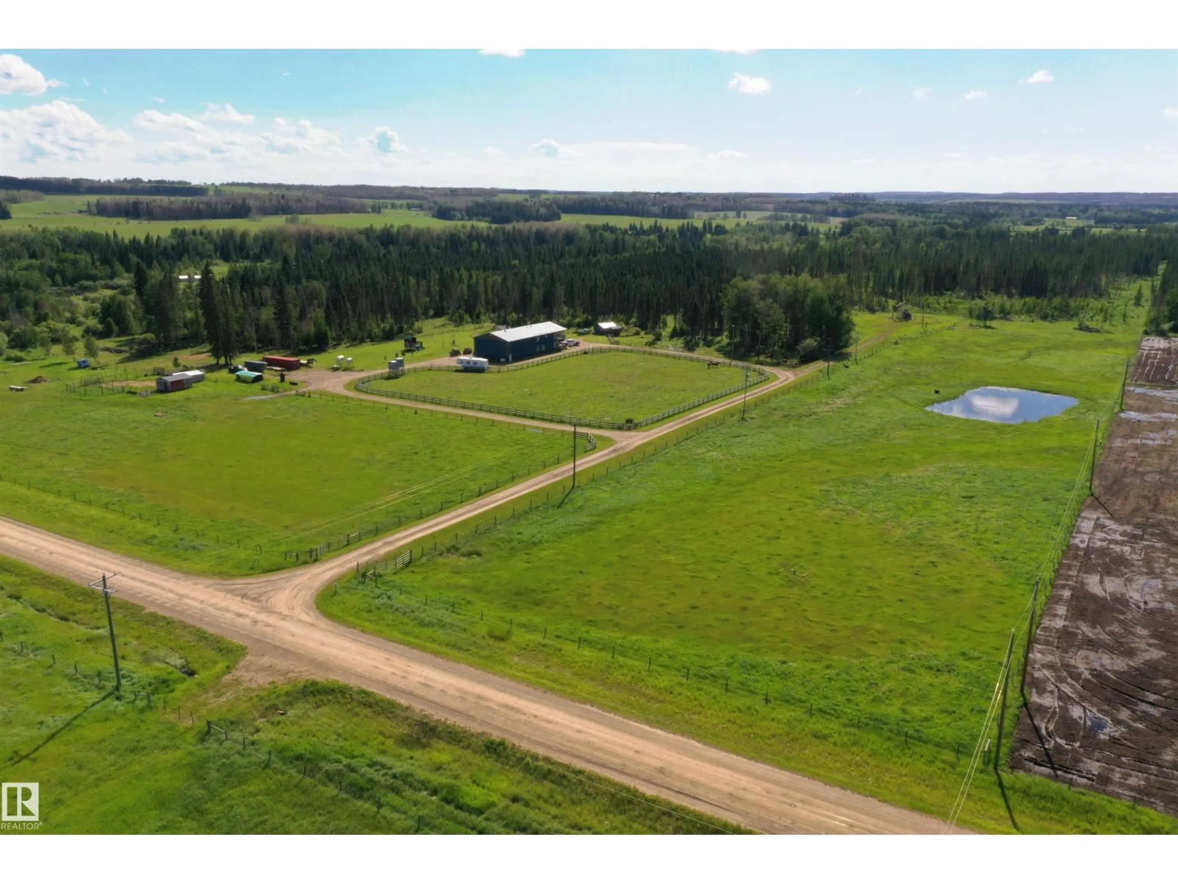 A pic from outside/outdoor area/front of a property/back of a property/a pic from drone, water/lake/river/ocean view for 47406 RGE ROAD 40, Rural Brazeau County Alberta T0C0P0