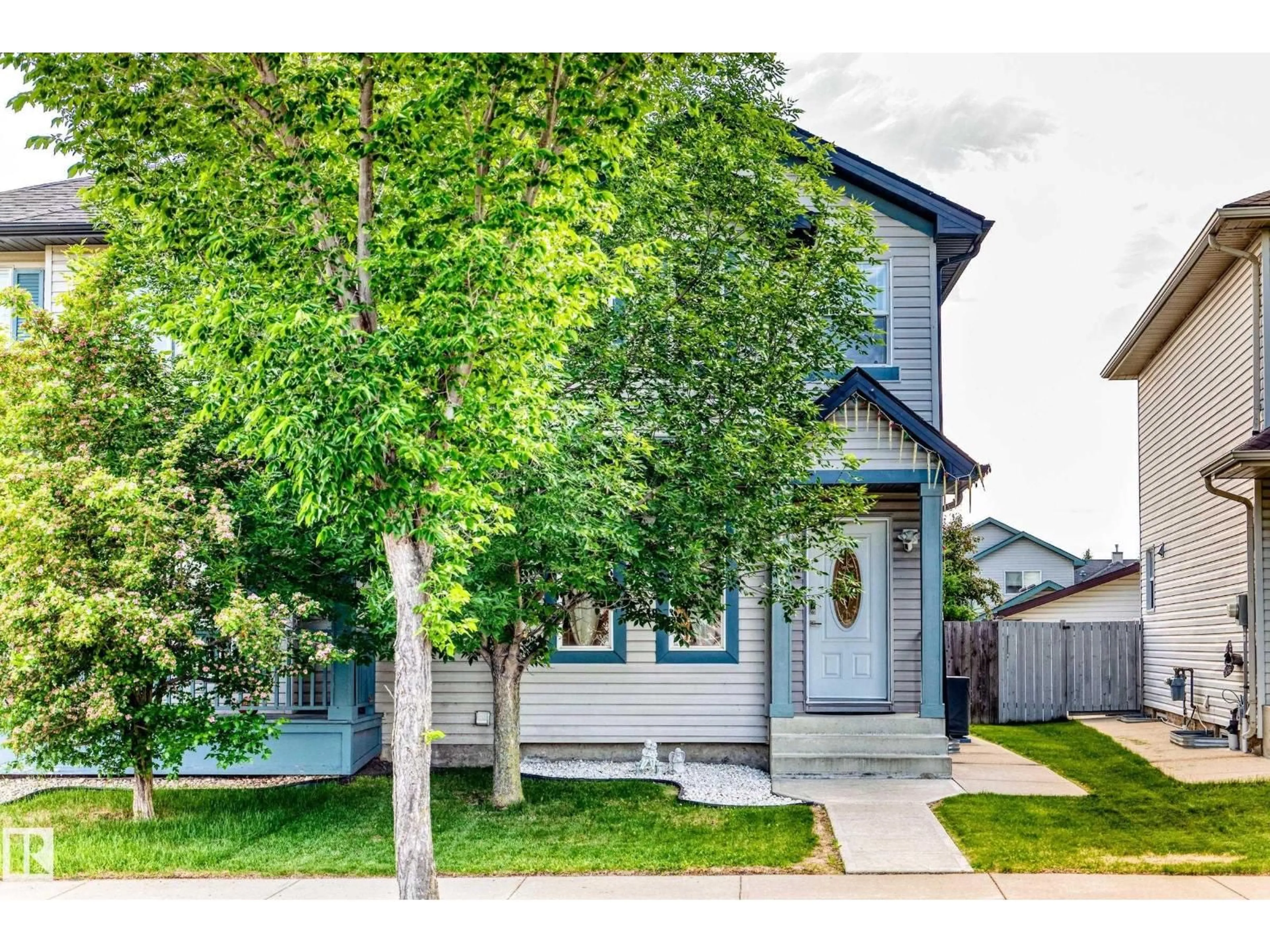 Home with vinyl exterior material, street for NW - 17408 87 ST, Edmonton Alberta T5Z3Z3