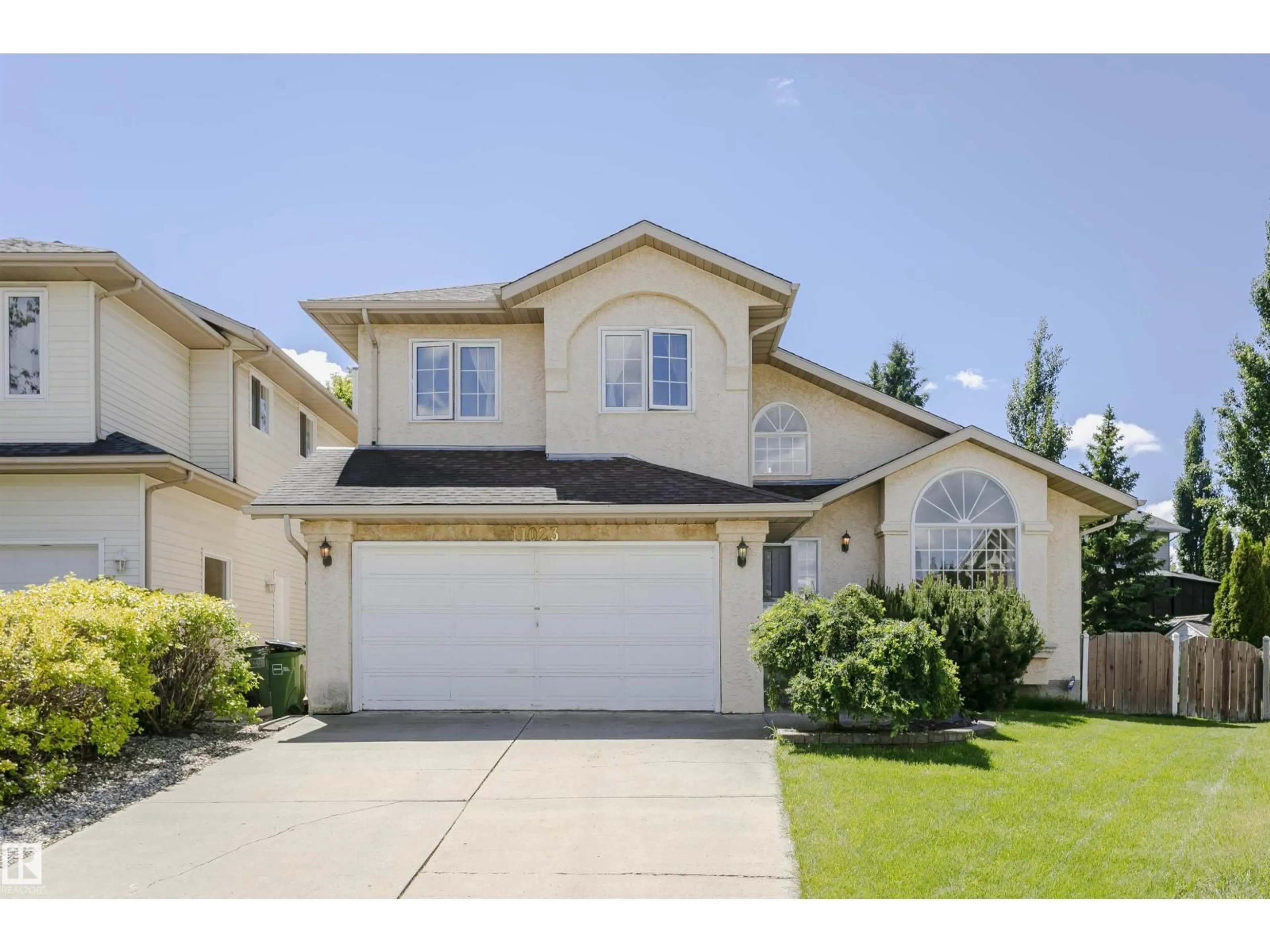 Home with vinyl exterior material, street for 11023 11A AV, Edmonton Alberta T6J6M6