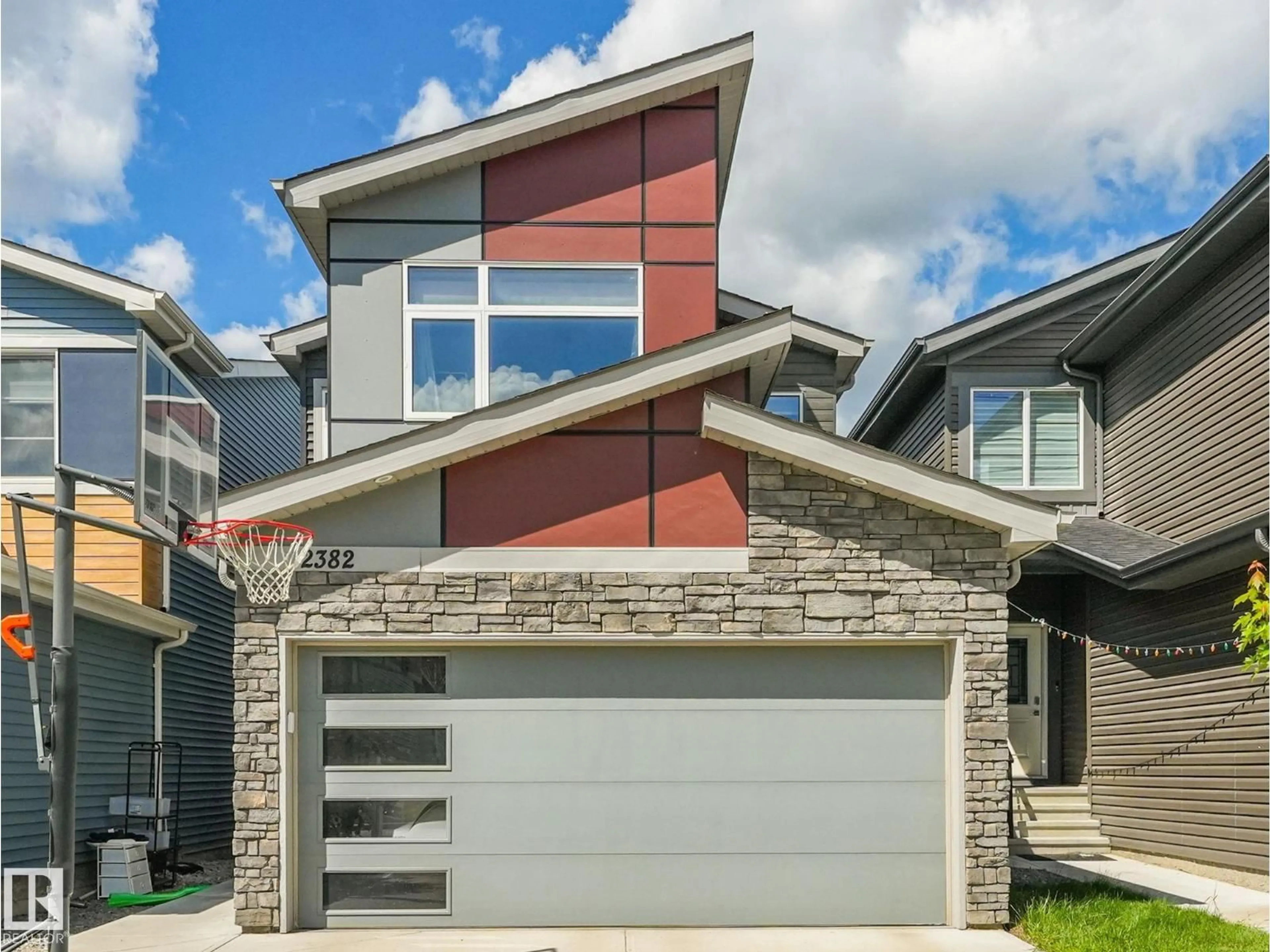 Home with vinyl exterior material, street for 2382 KELLY CIRCLE, Edmonton Alberta T6W4G3