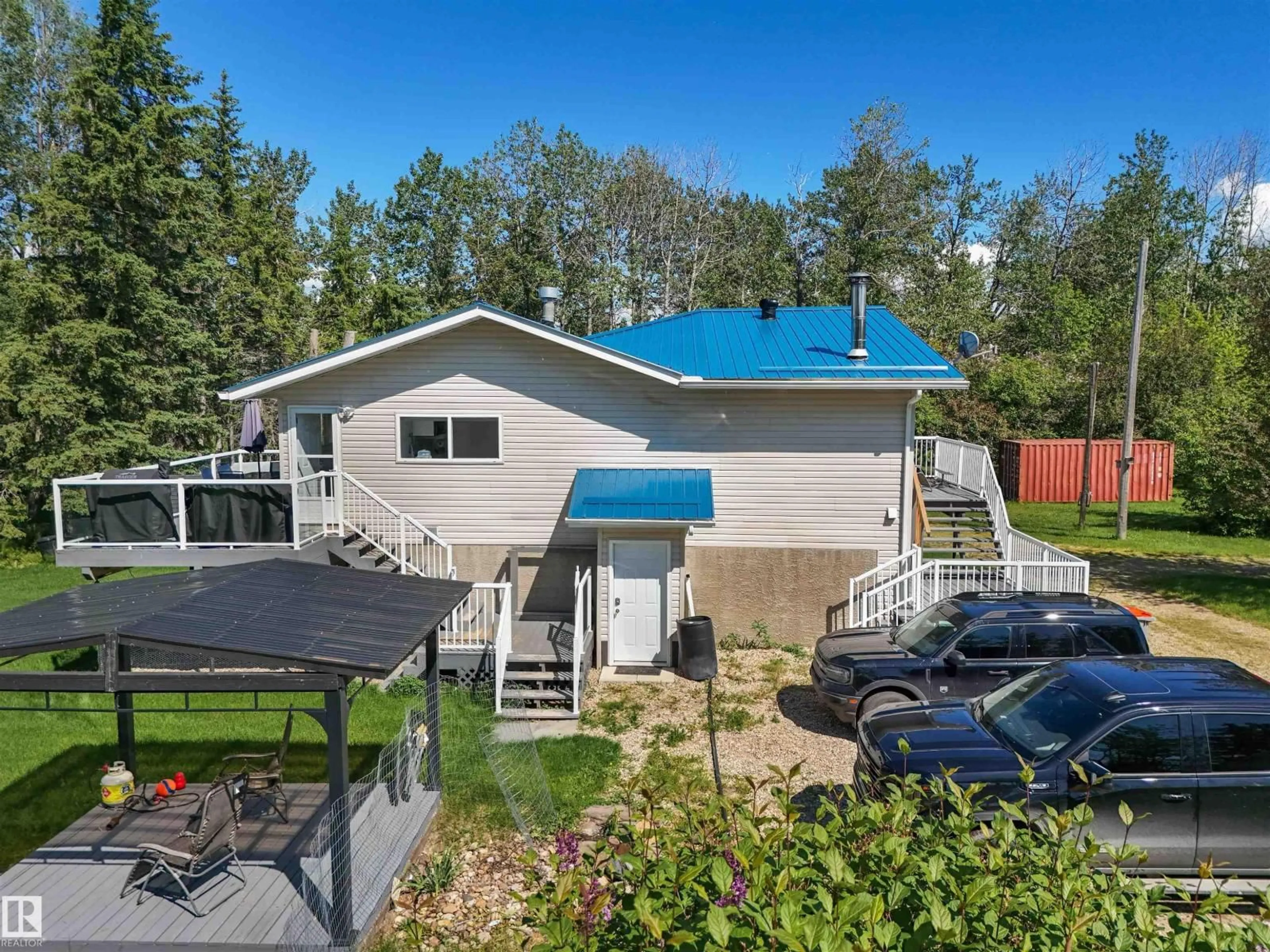 A pic from outside/outdoor area/front of a property/back of a property/a pic from drone, unknown for 310 HWY 13 E, Alder Flats Alberta T0C0A0