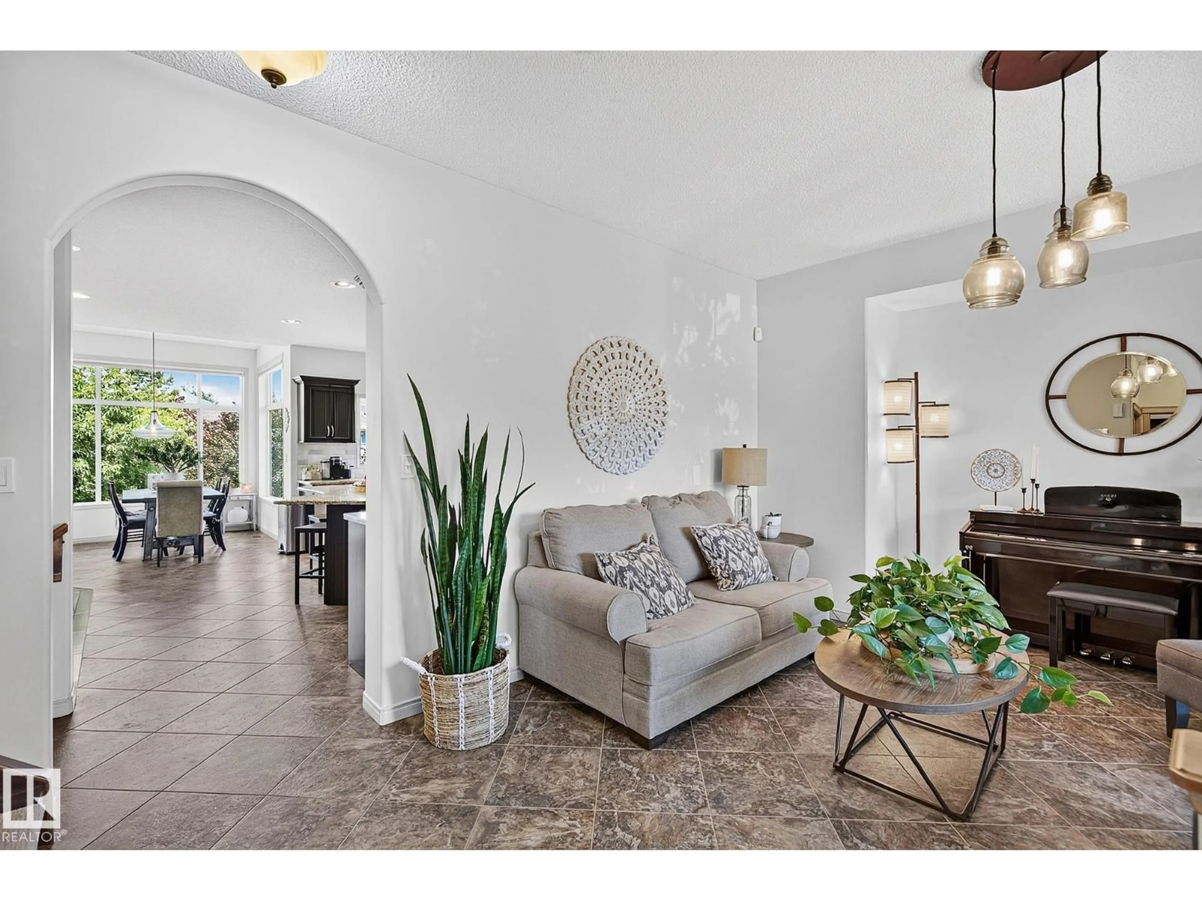 Living room with furniture, ceramic/tile floor for 163 GALLAND CR, Edmonton Alberta T5T6P4
