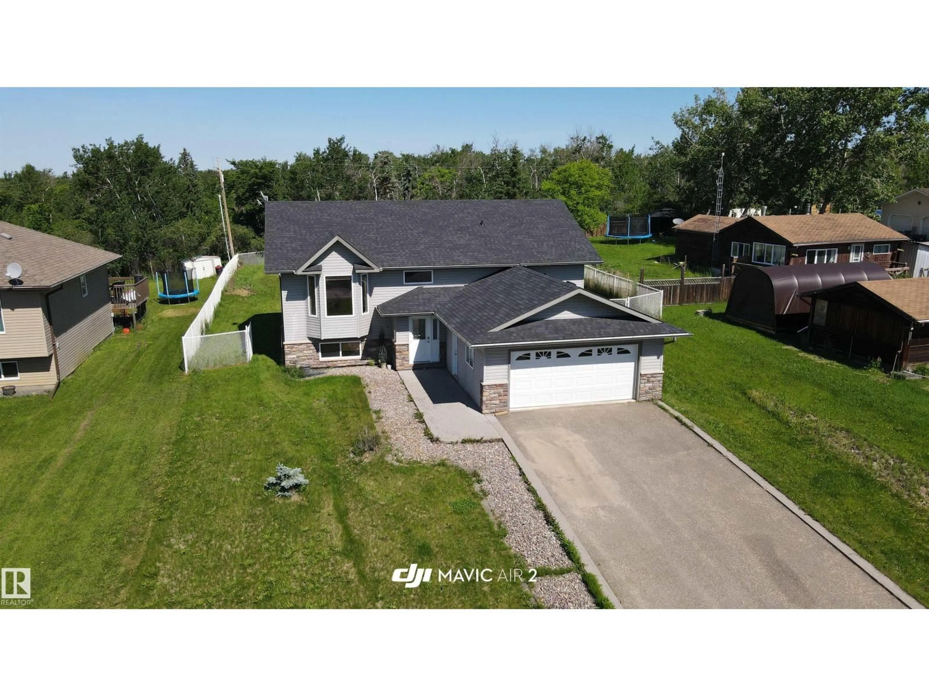 A pic from outside/outdoor area/front of a property/back of a property/a pic from drone, unknown for #341 - 46410 TWP RD 610, Rural Bonnyville M.D. Alberta T9N2J6