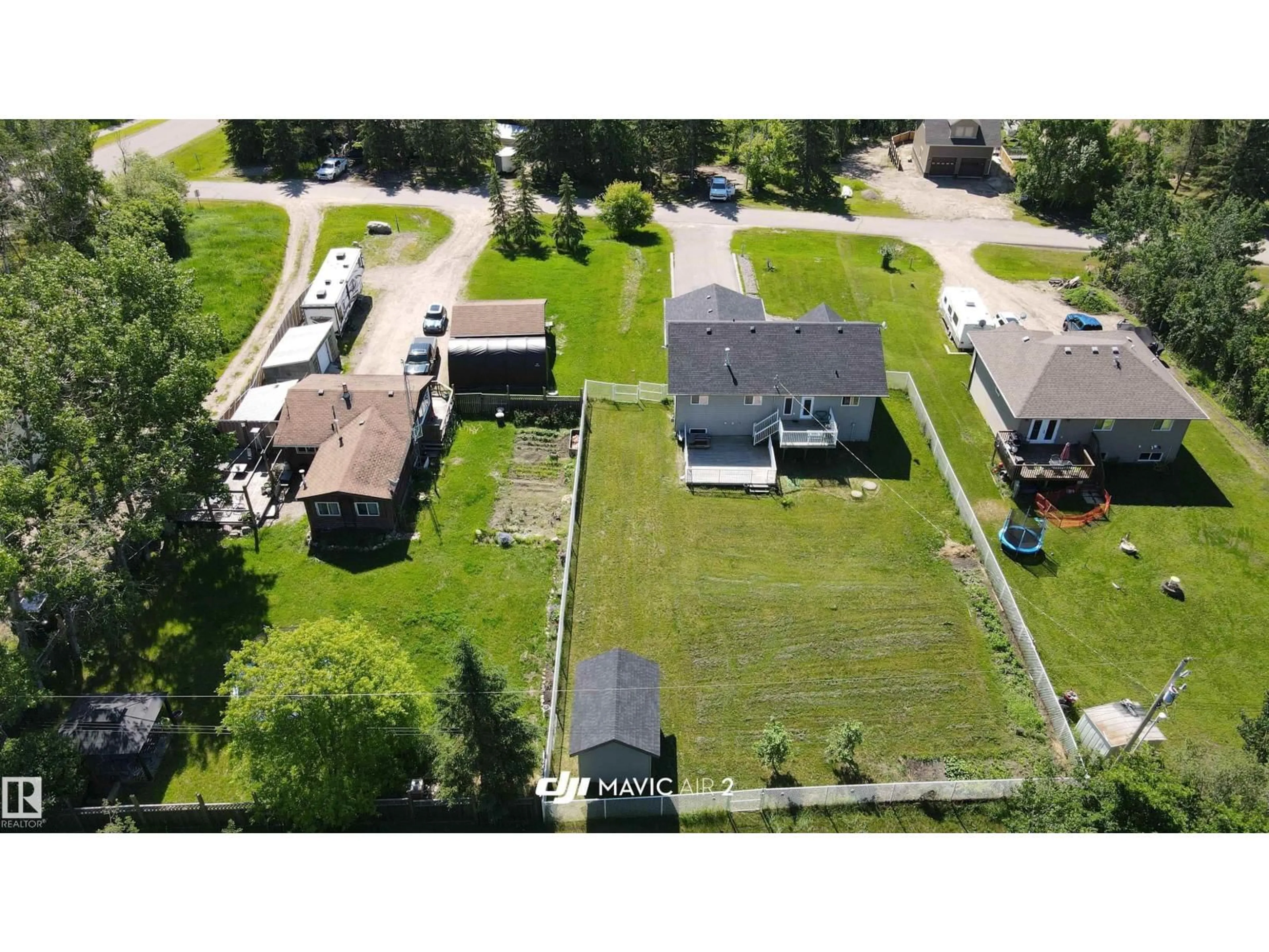 A pic from outside/outdoor area/front of a property/back of a property/a pic from drone, street for #341 - 46410 TWP RD 610, Rural Bonnyville M.D. Alberta T9N2J6