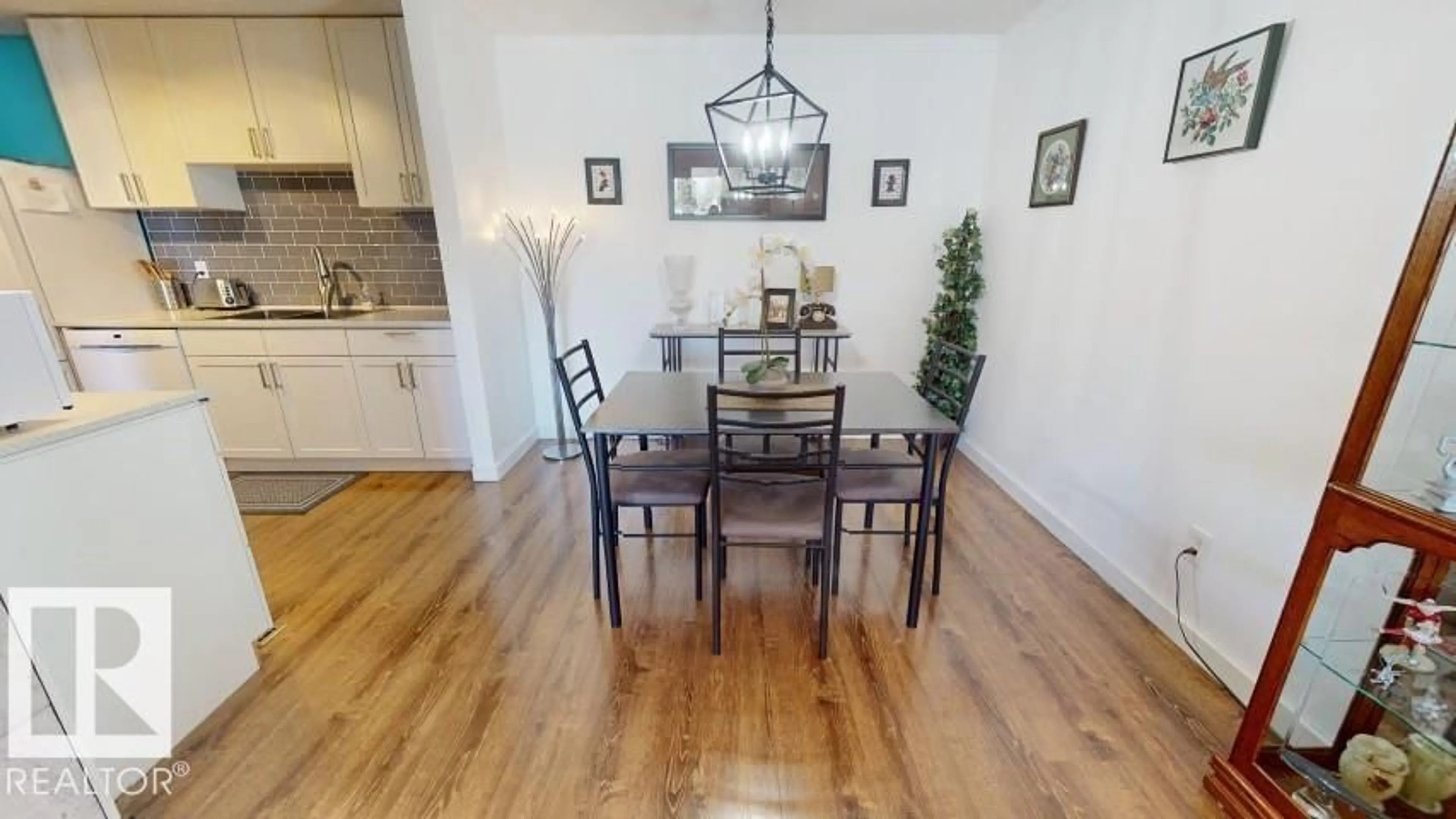 Dining room, wood/laminate floor for Unit 73 - 2703 79 ST, Edmonton Alberta T6K3Z6