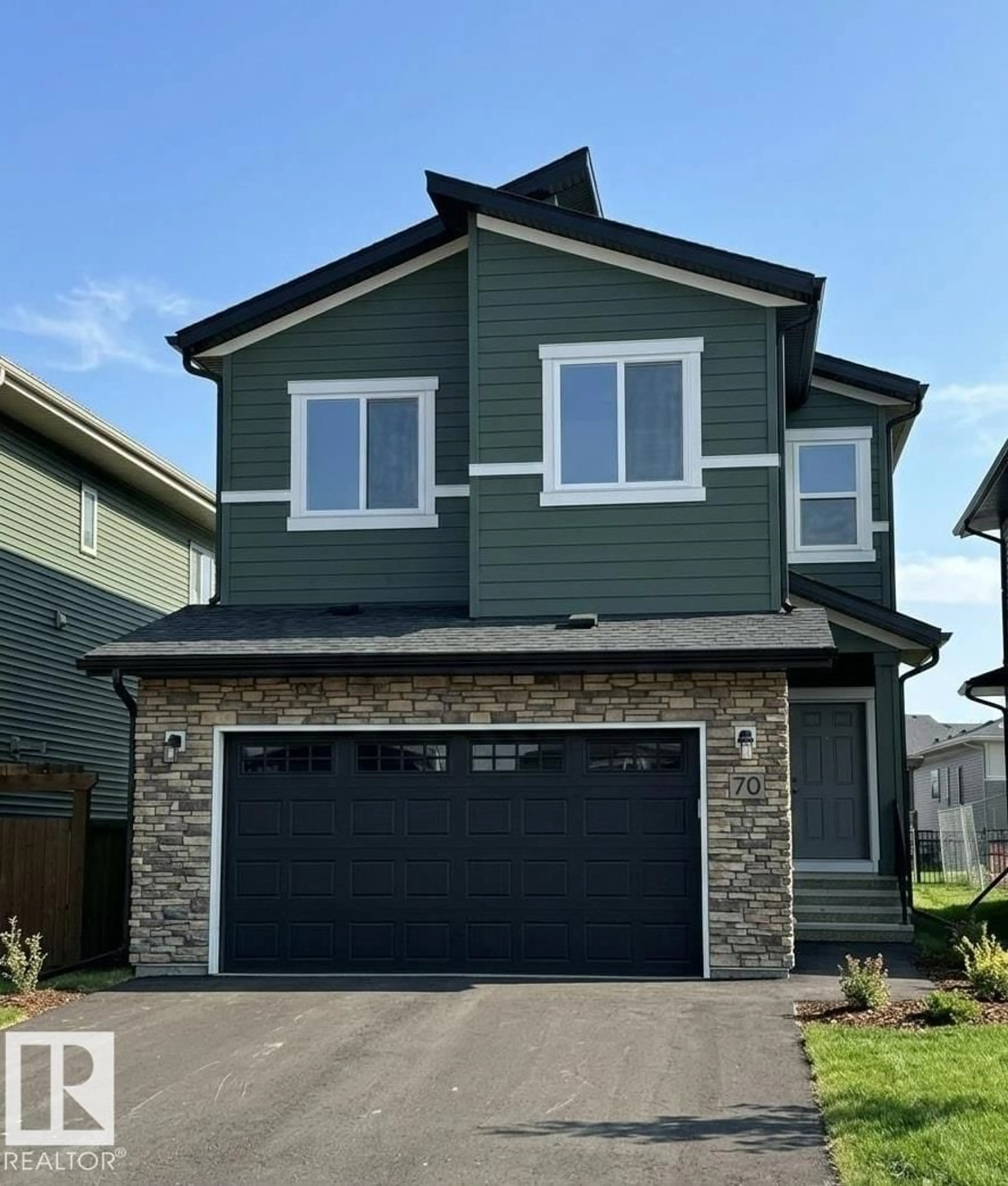 Home with vinyl exterior material, street for 70 BRUNSWYCK CR, Spruce Grove Alberta T7X0Z1
