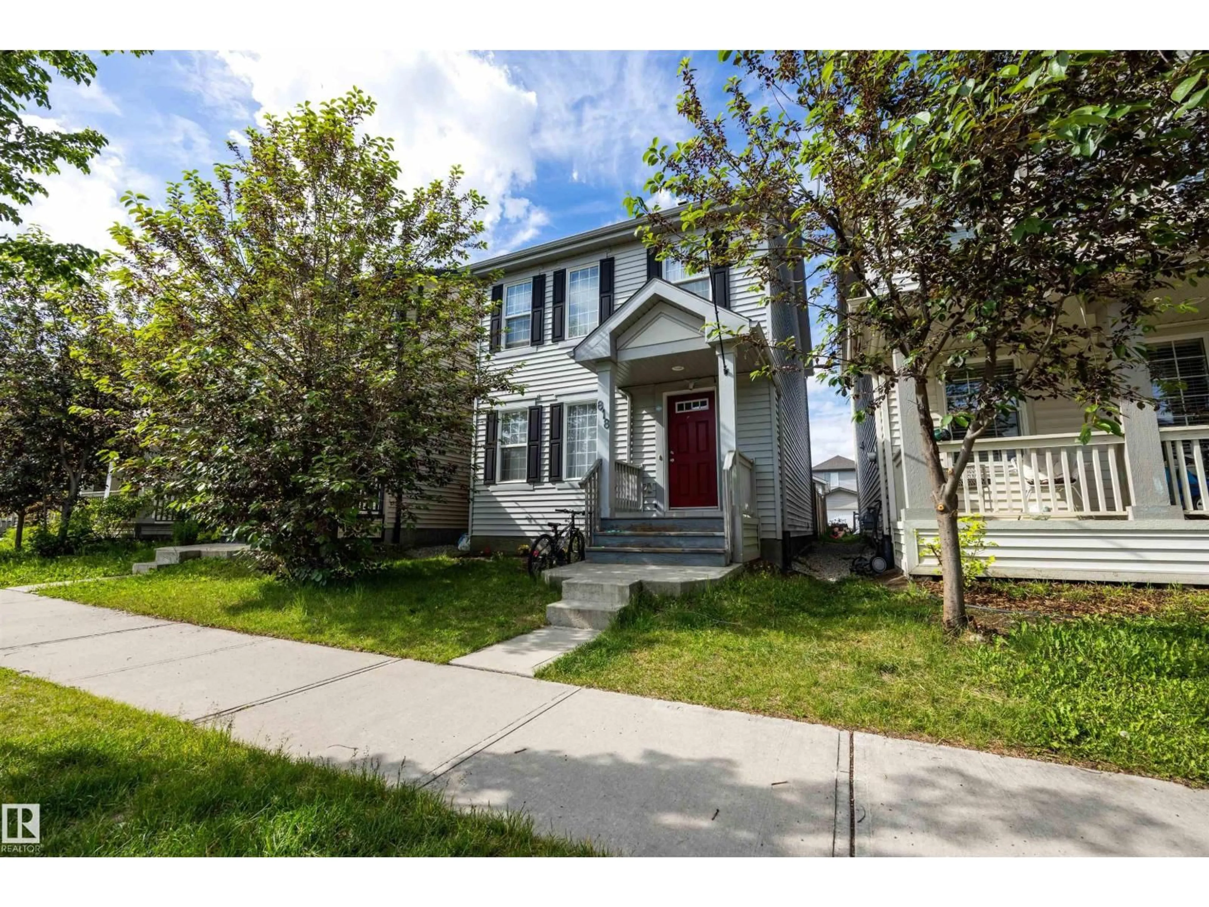 Home with vinyl exterior material, street for 818 EAGLESON LINK, Edmonton Alberta T6M0V3