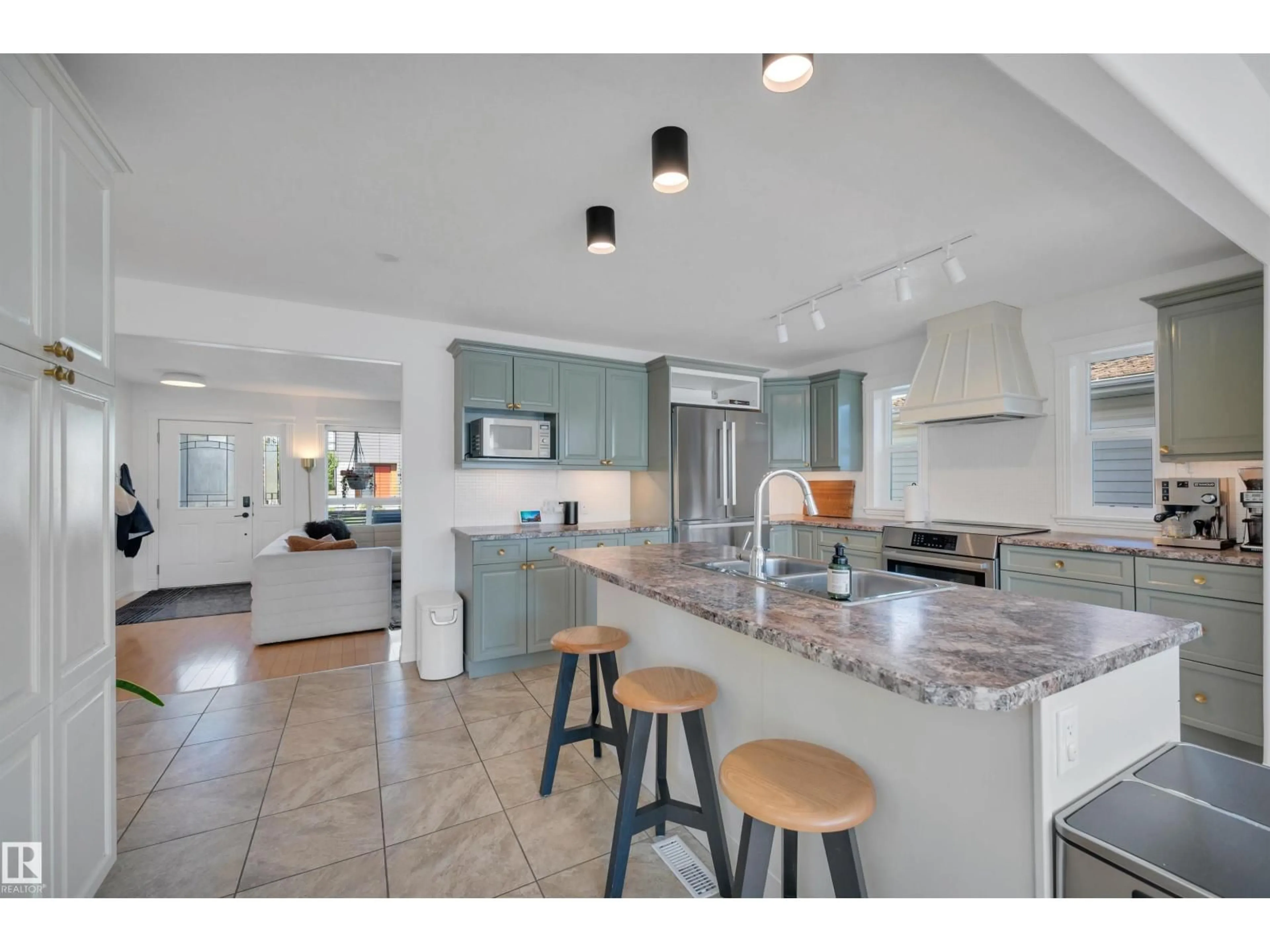 Open concept kitchen, ceramic/tile floor for 9015 148 ST, Edmonton Alberta T5R0Y5