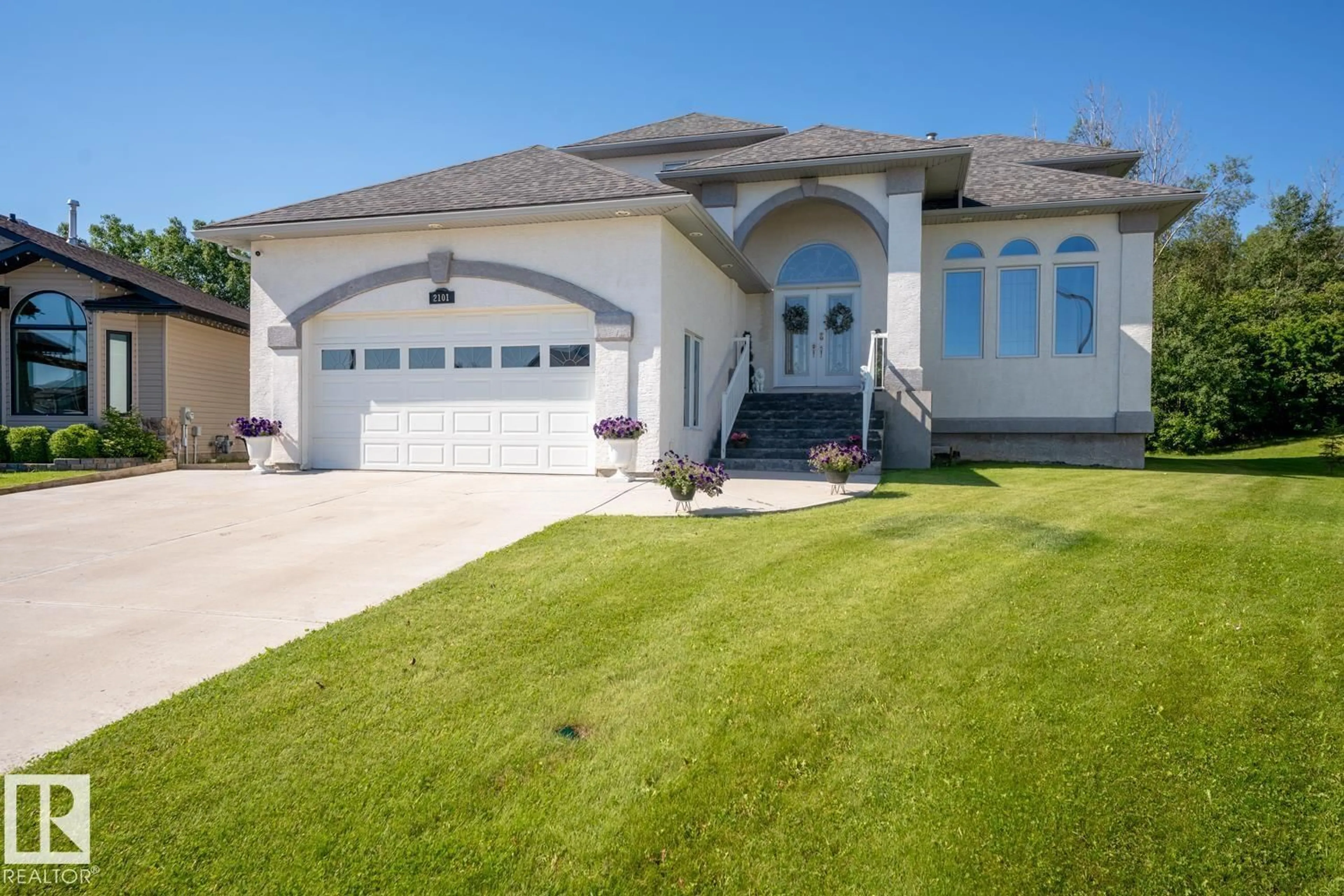 Home with vinyl exterior material, street for 2101 7 ST, Cold Lake Alberta T9M2B9