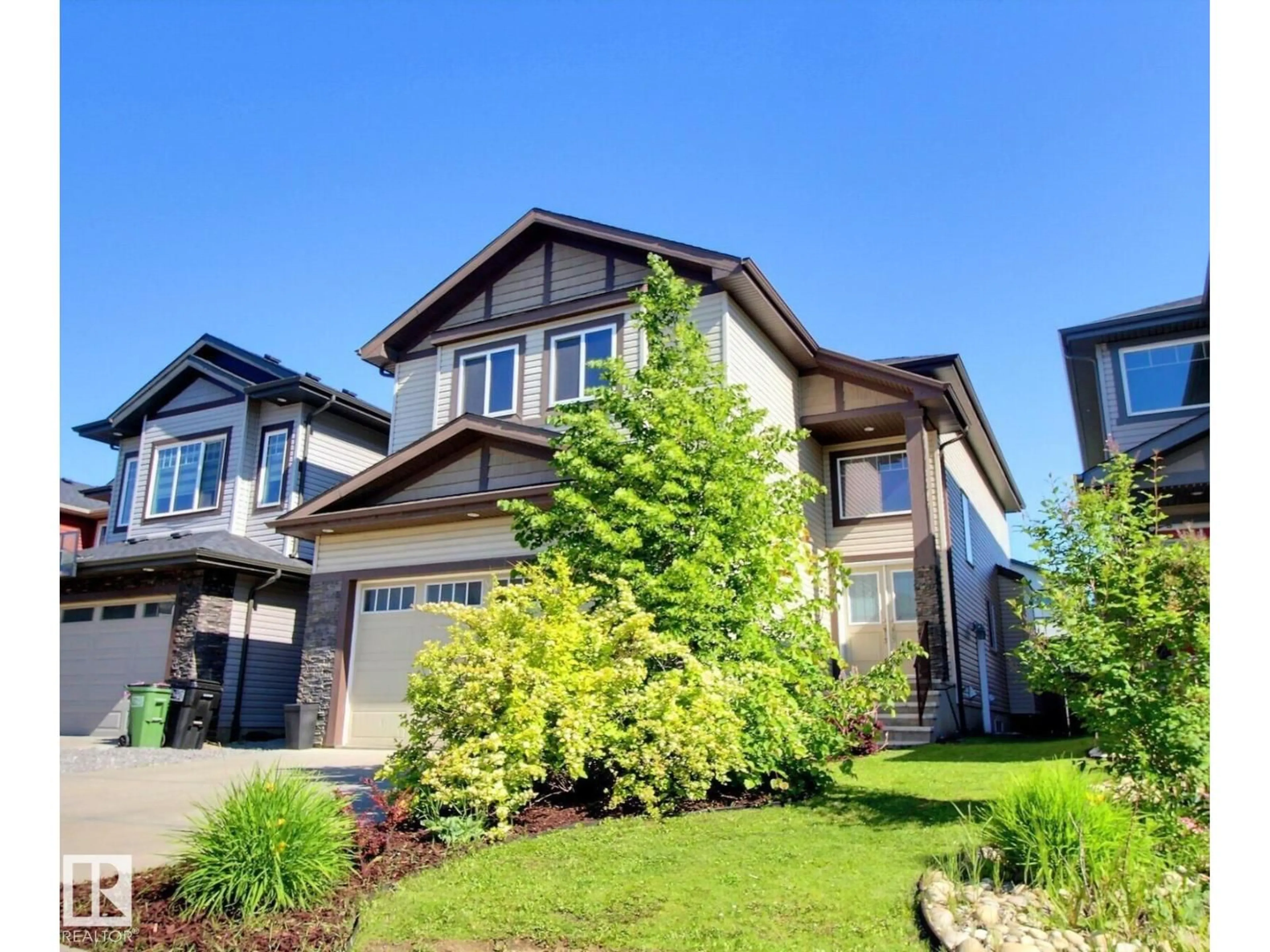 Home with vinyl exterior material, street for 4642 CHARLES WY, Edmonton Alberta T6W3H1