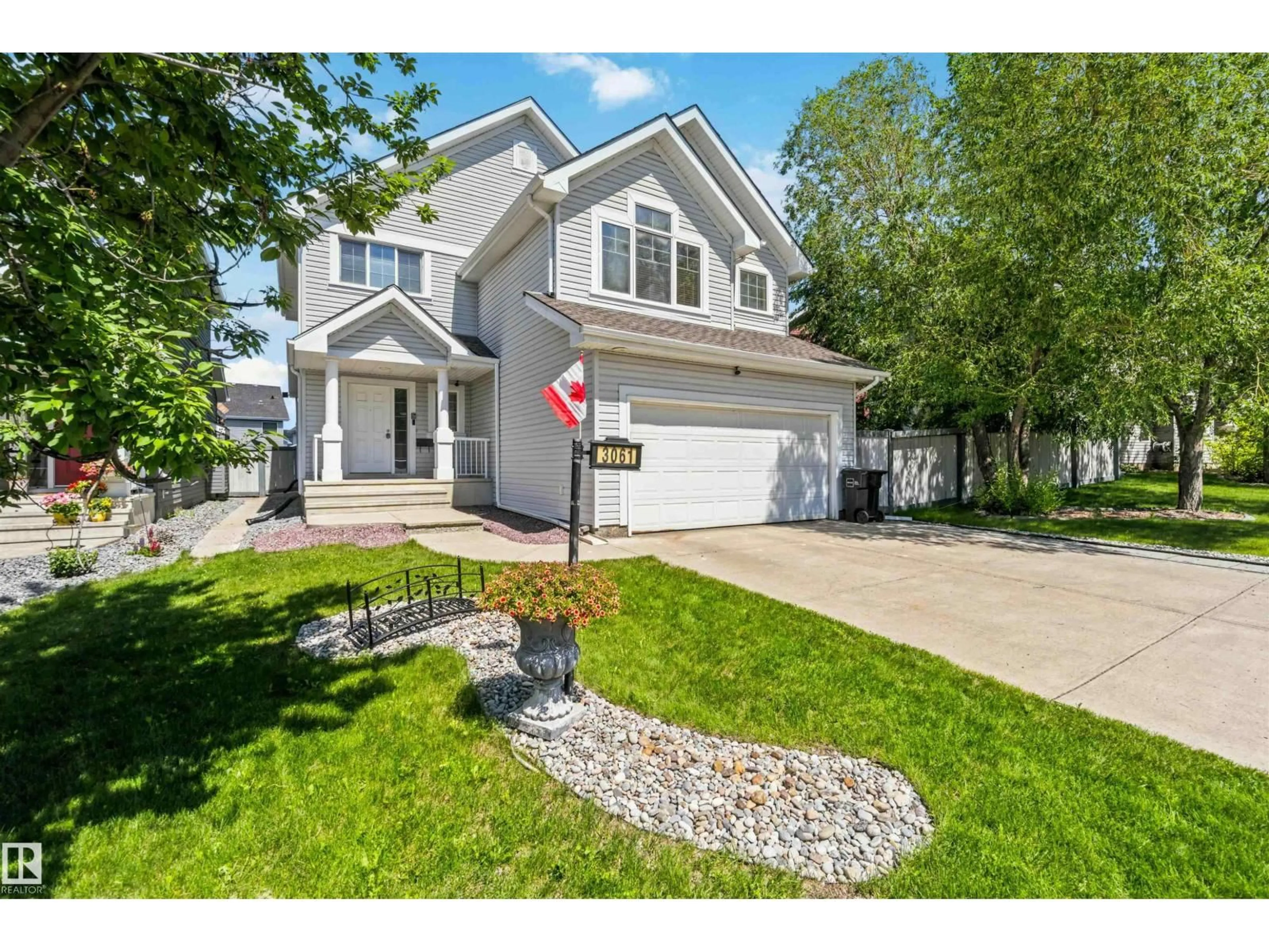 Home with vinyl exterior material, street for SW - 3061 SPENCE WD, Edmonton Alberta T6X0A5