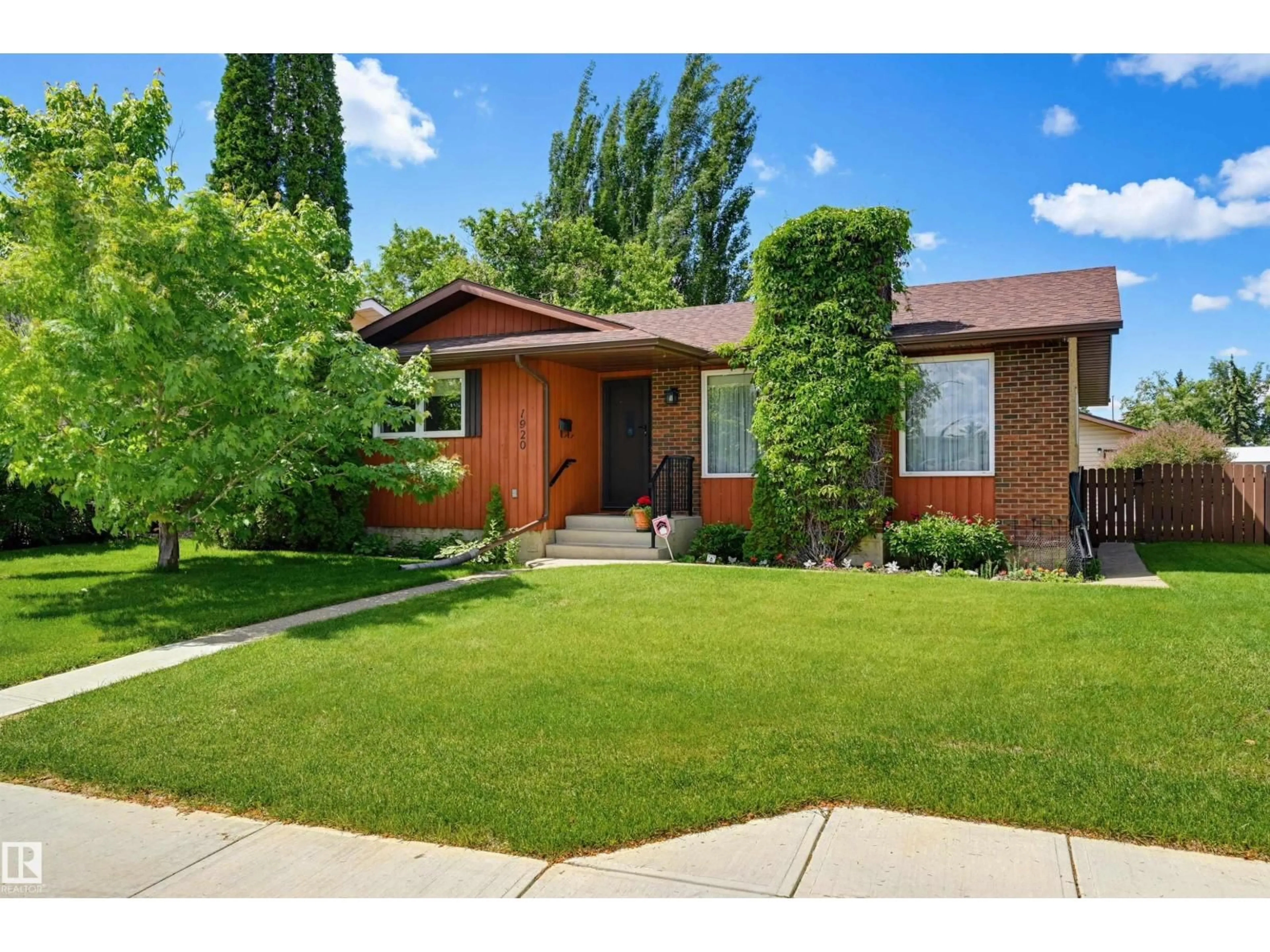 Home with brick exterior material, street for NW - 1920 65 ST, Edmonton Alberta T6L1T2