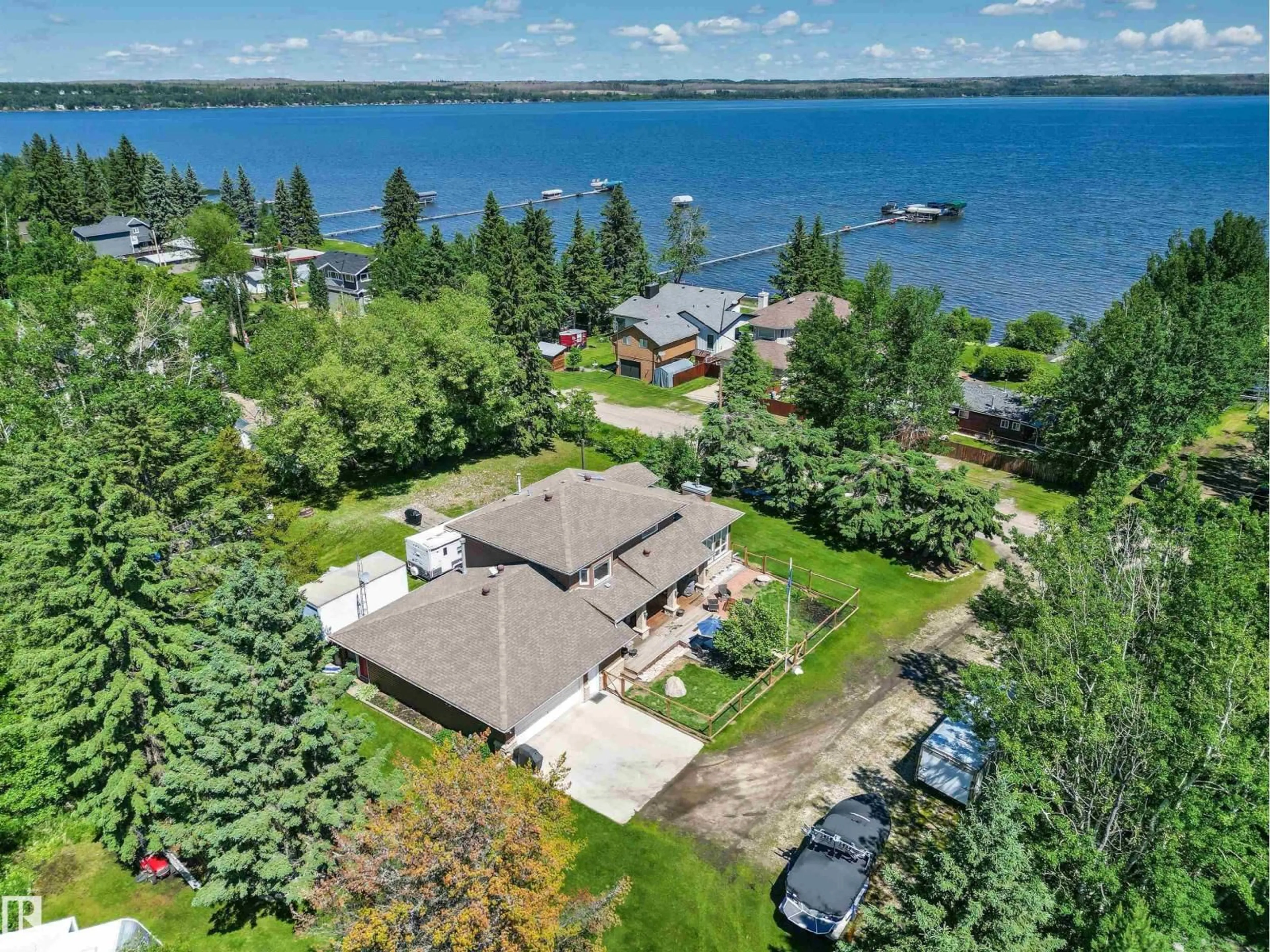 A pic from outside/outdoor area/front of a property/back of a property/a pic from drone, water/lake/river/ocean view for 75 RGE ROAD 54 A, Rural Parkland County Alberta T0E2B0