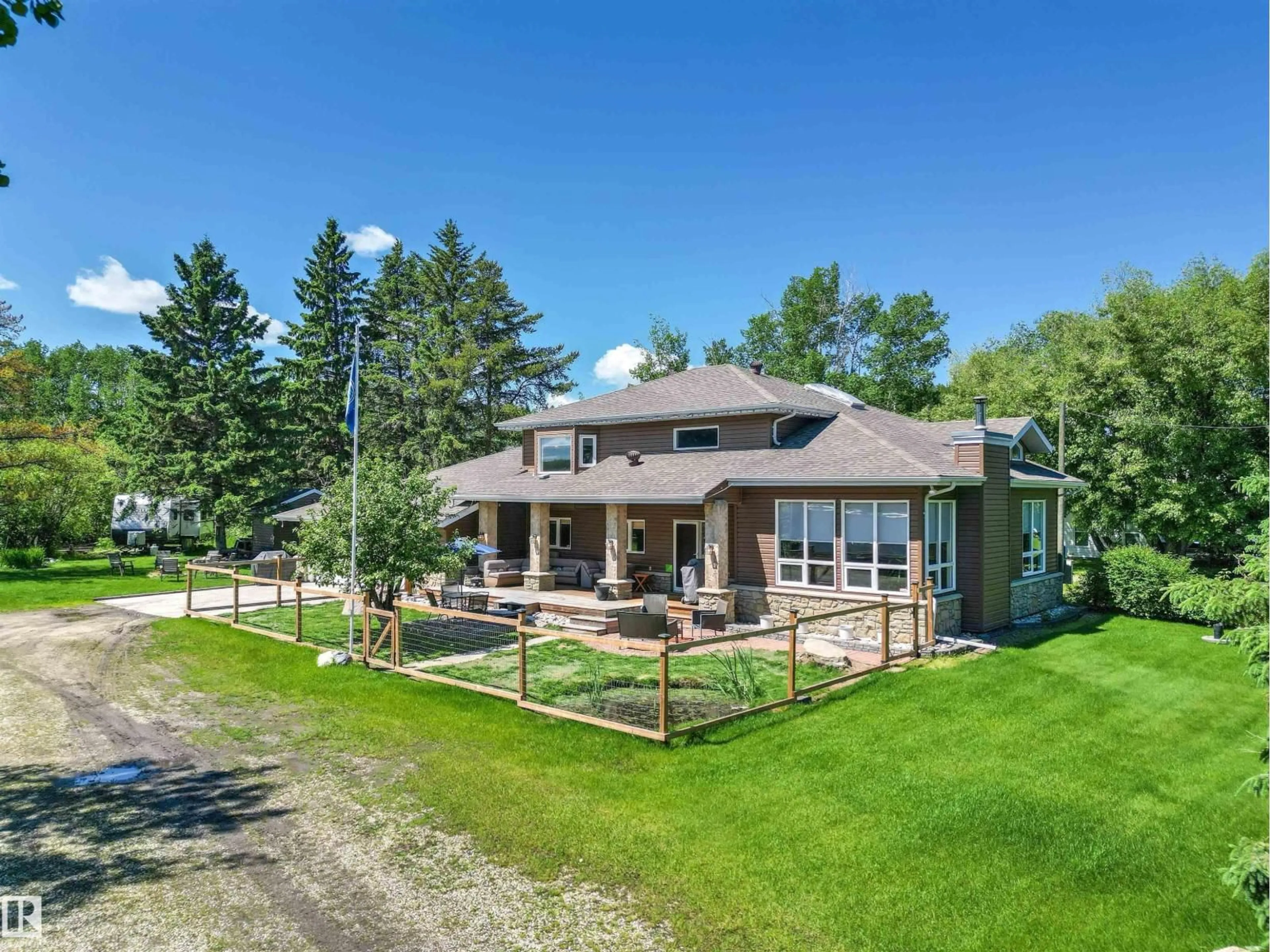 A pic from outside/outdoor area/front of a property/back of a property/a pic from drone, mountain view for 75 RGE ROAD 54 A, Rural Parkland County Alberta T0E2B0