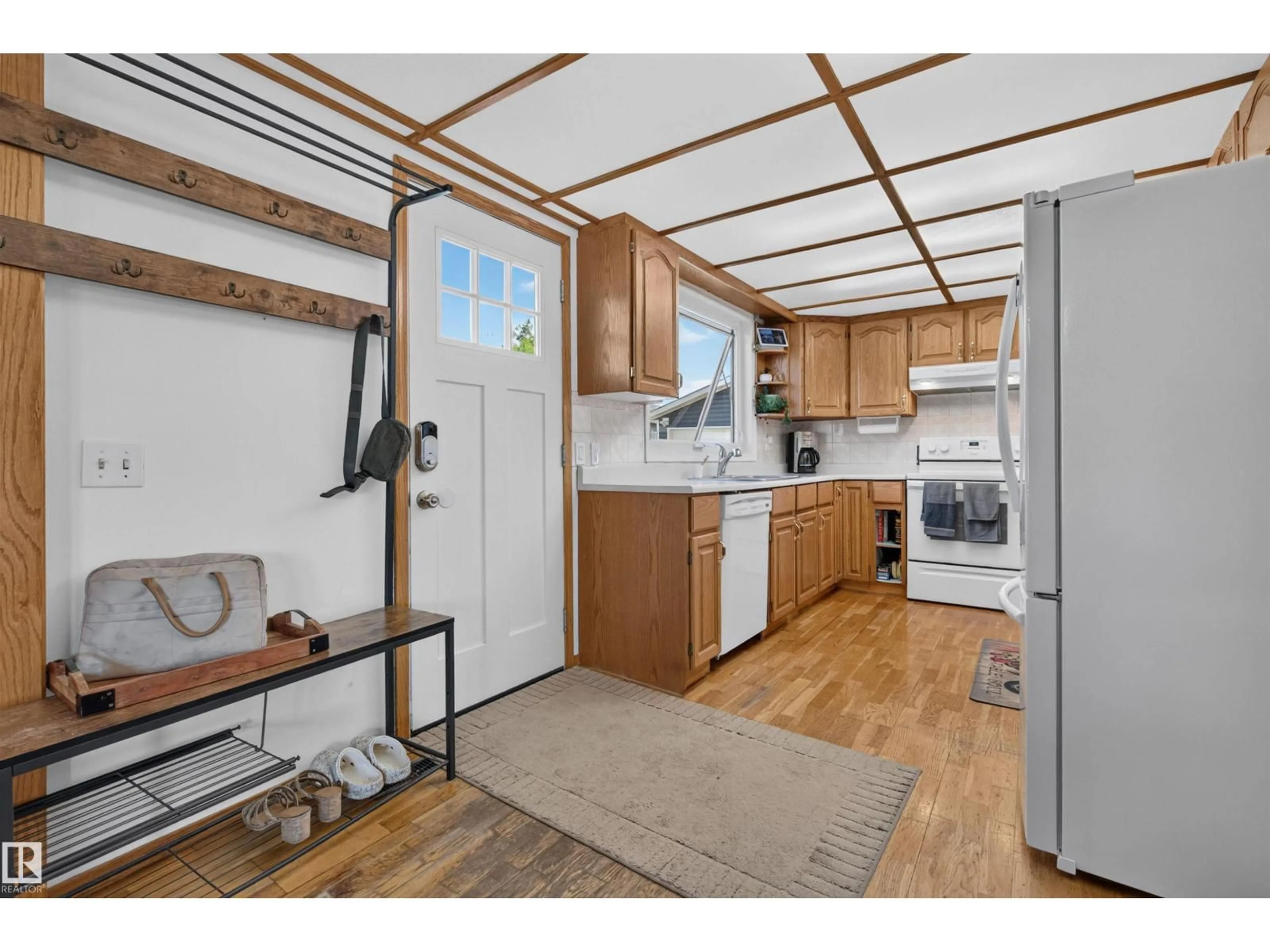 Open concept kitchen, wood/laminate floor for 9417 98 AV, Morinville Alberta T8R1J5