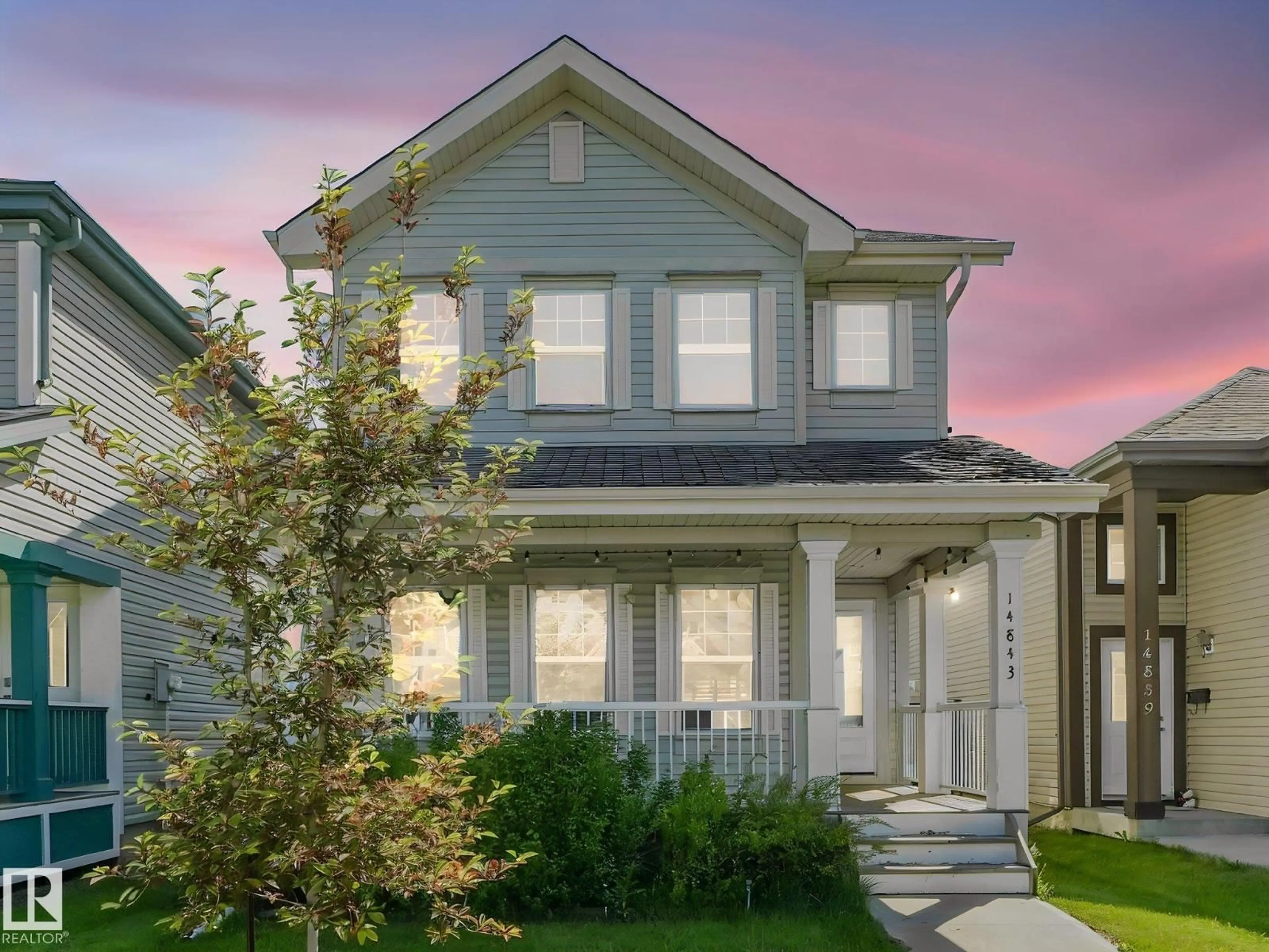 Home with vinyl exterior material, street for NW - 14843 140 ST, Edmonton Alberta T6V0A4