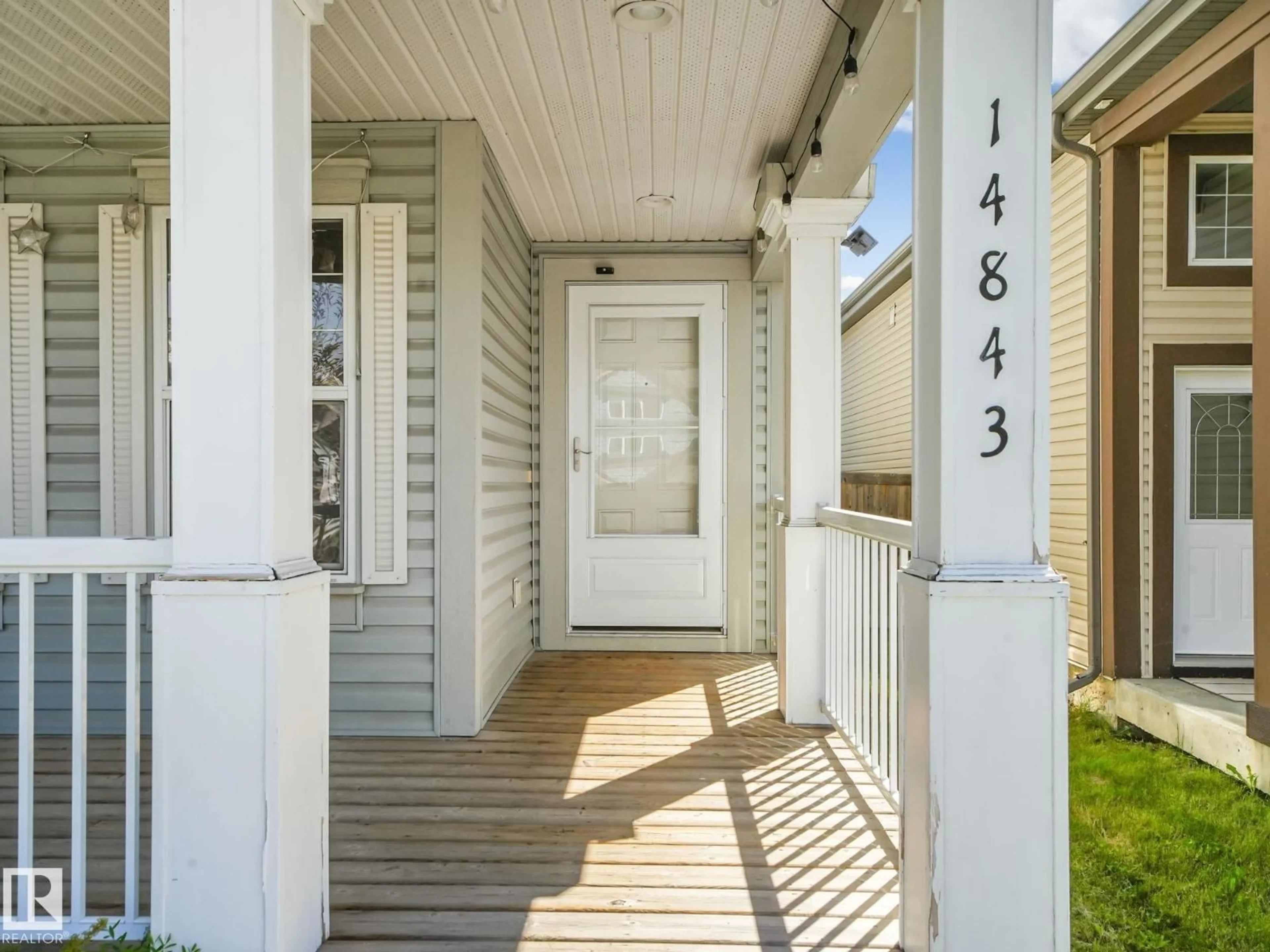 Home with vinyl exterior material, street for NW - 14843 140 ST, Edmonton Alberta T6V0A4