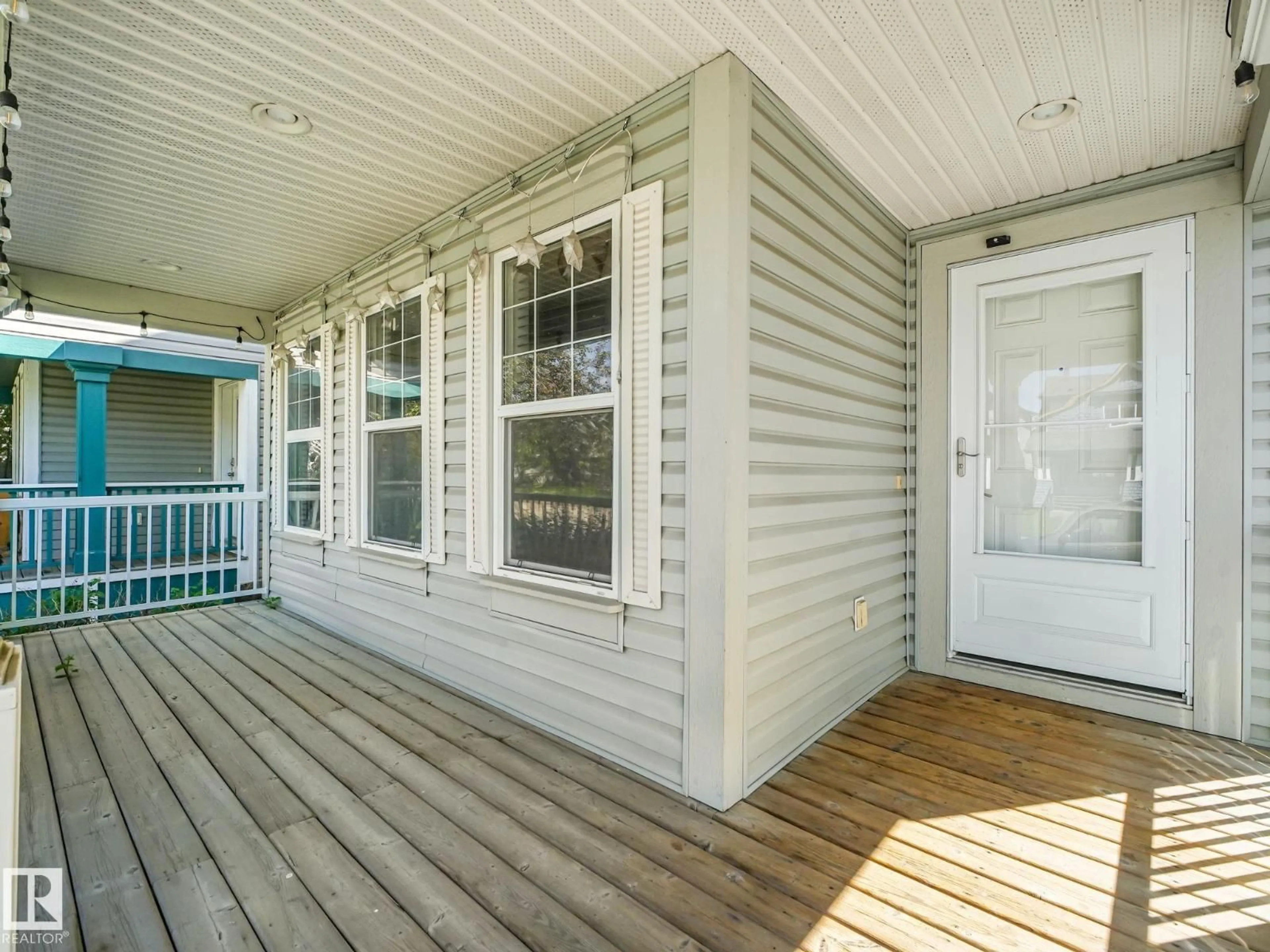 Home with vinyl exterior material, street for NW - 14843 140 ST, Edmonton Alberta T6V0A4