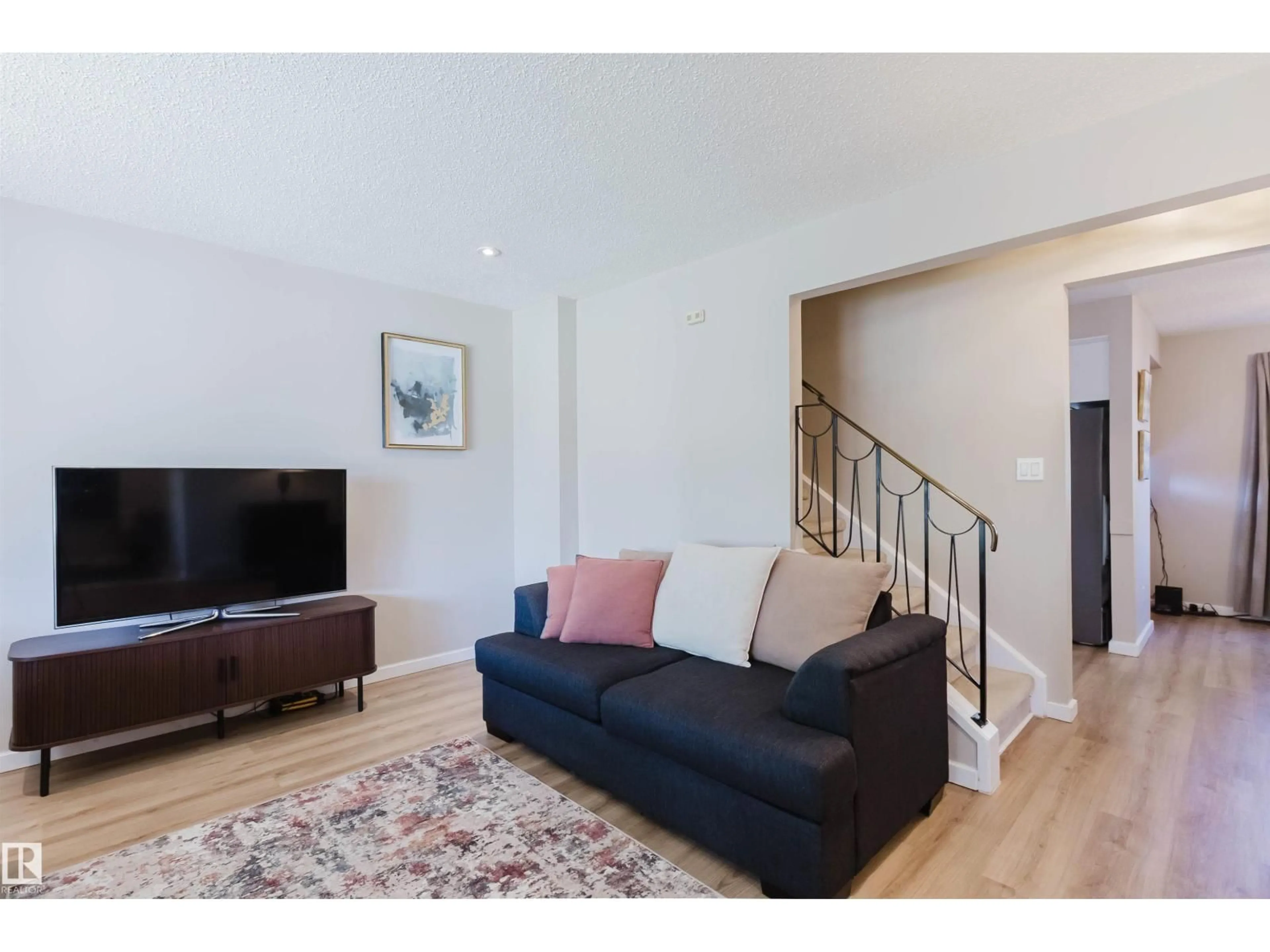 Living room with furniture, unknown for 10946 BEAUMARIS RD, Edmonton Alberta T5X1Z6