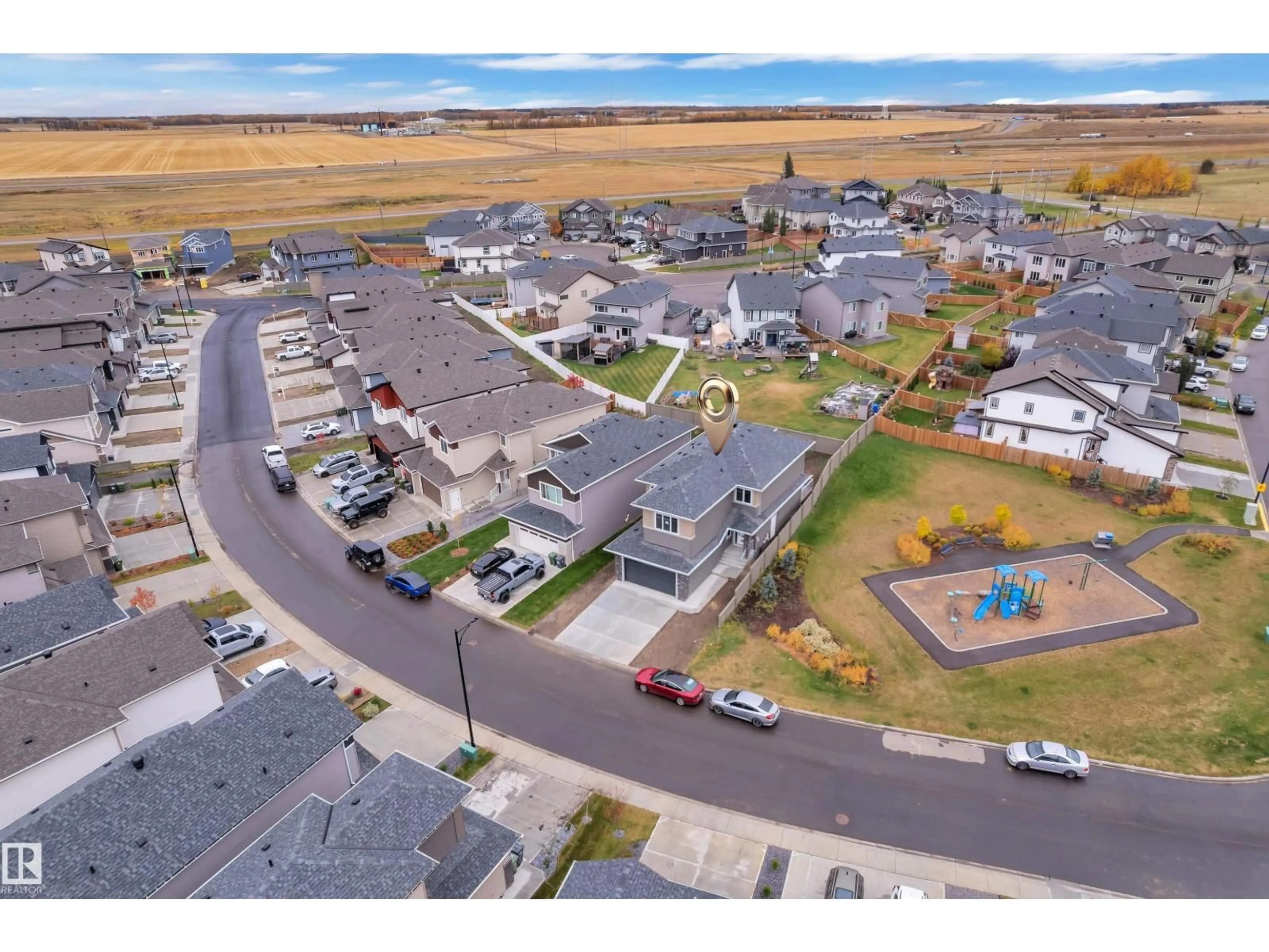 A pic from outside/outdoor area/front of a property/back of a property/a pic from drone, mountain view for 717 ASTORIA WY, Devon Alberta T9G0M7