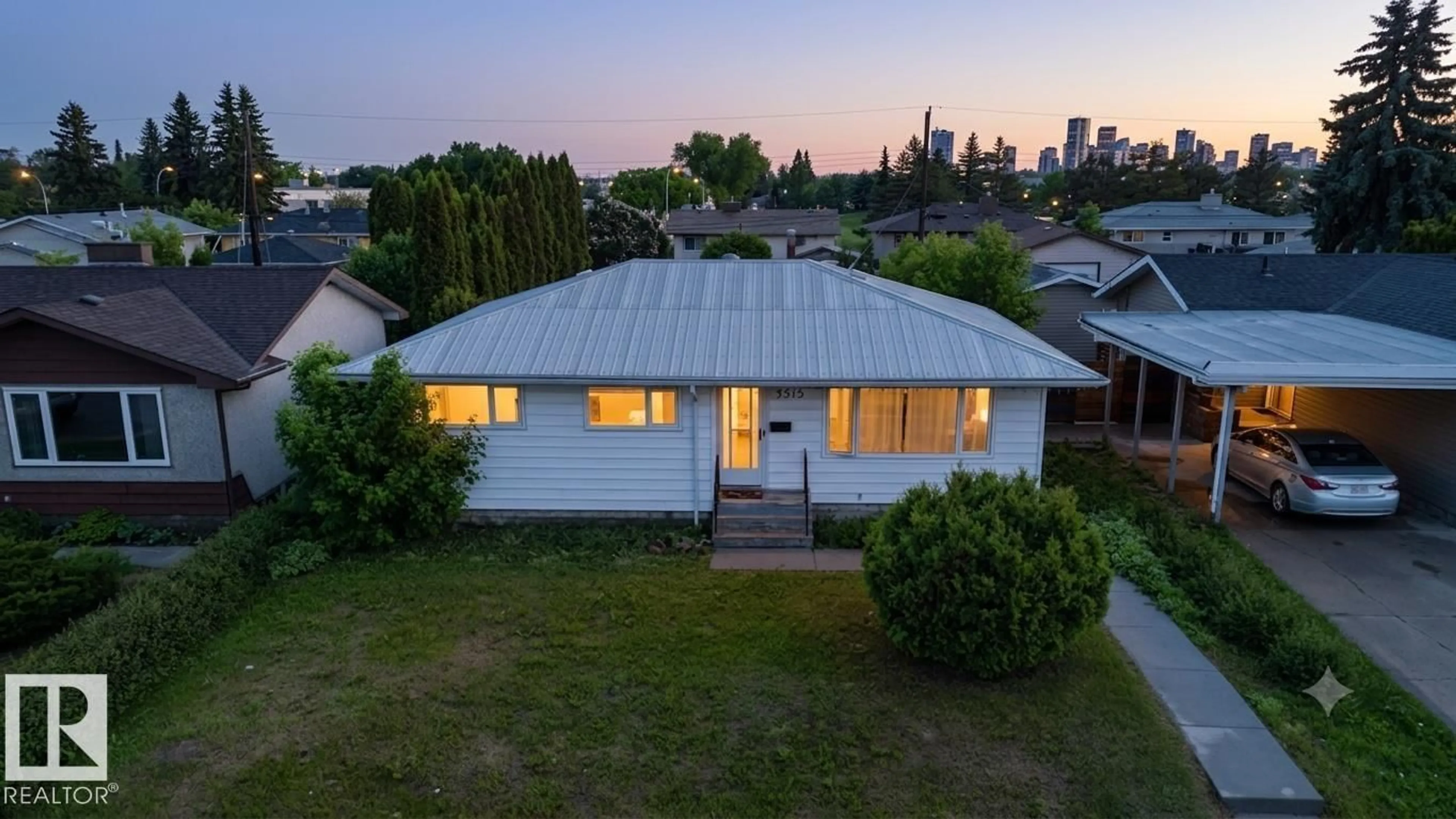 A pic from outside/outdoor area/front of a property/back of a property/a pic from drone, unknown for 7515 130 AV, Edmonton Alberta T5C1Y3