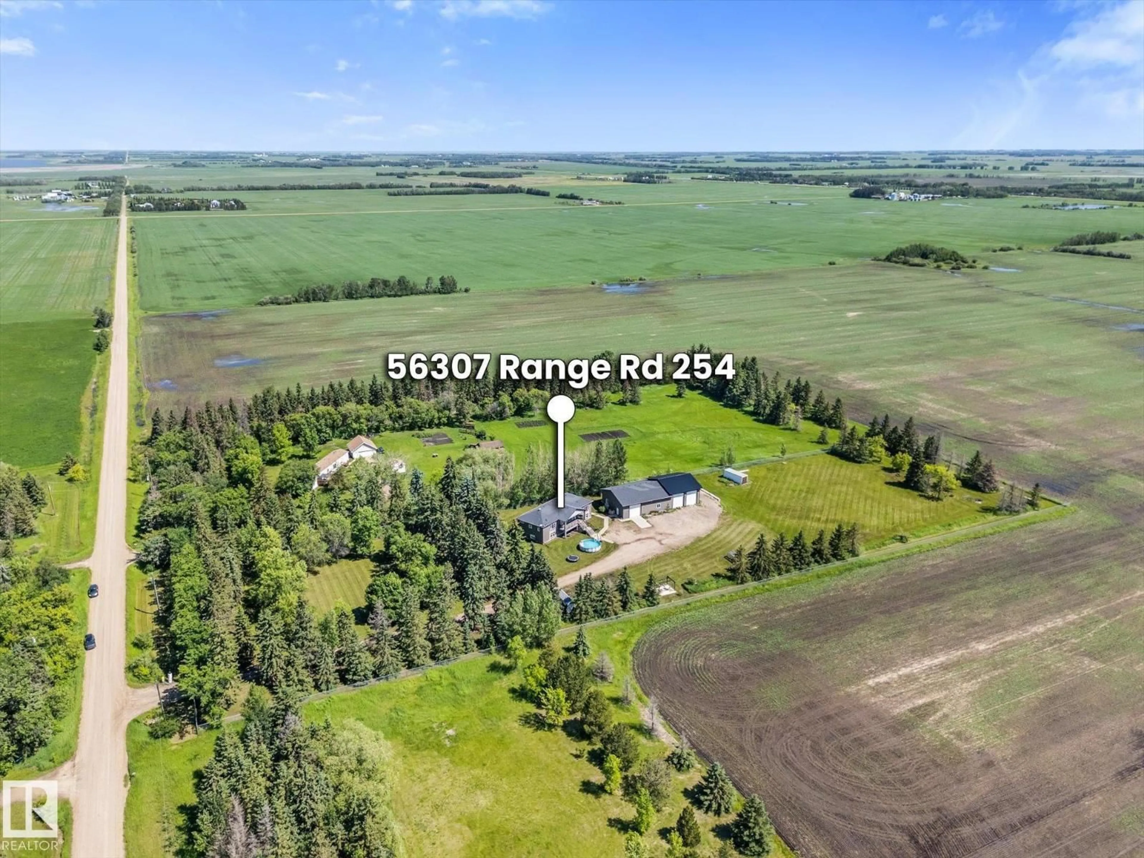 A pic from outside/outdoor area/front of a property/back of a property/a pic from drone, building for 56307 RGE ROAD 254, Rural Sturgeon County Alberta T8R0S4