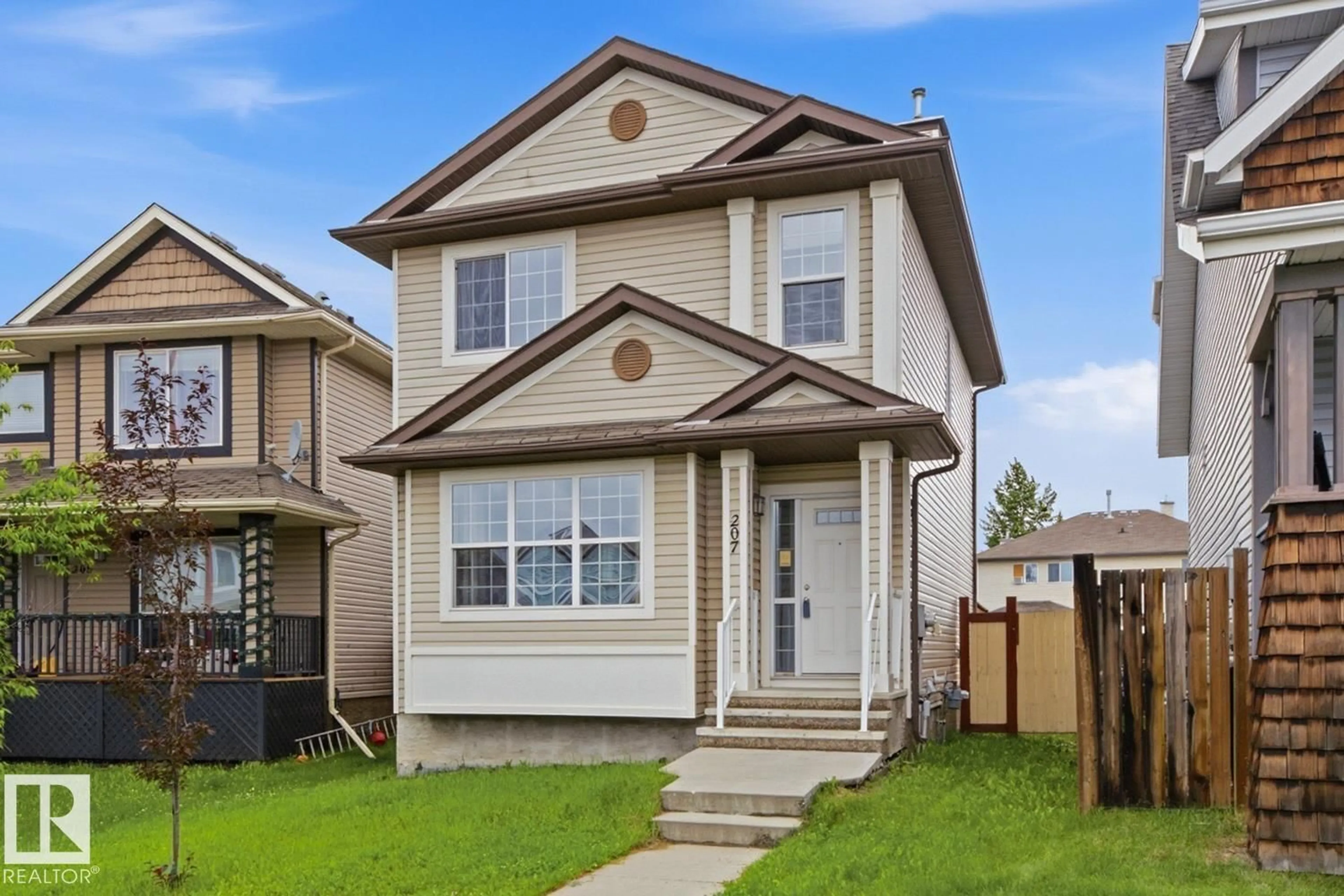 Home with vinyl exterior material, street for 207 SOUTHWICK WAY, Leduc Alberta T9E0G1