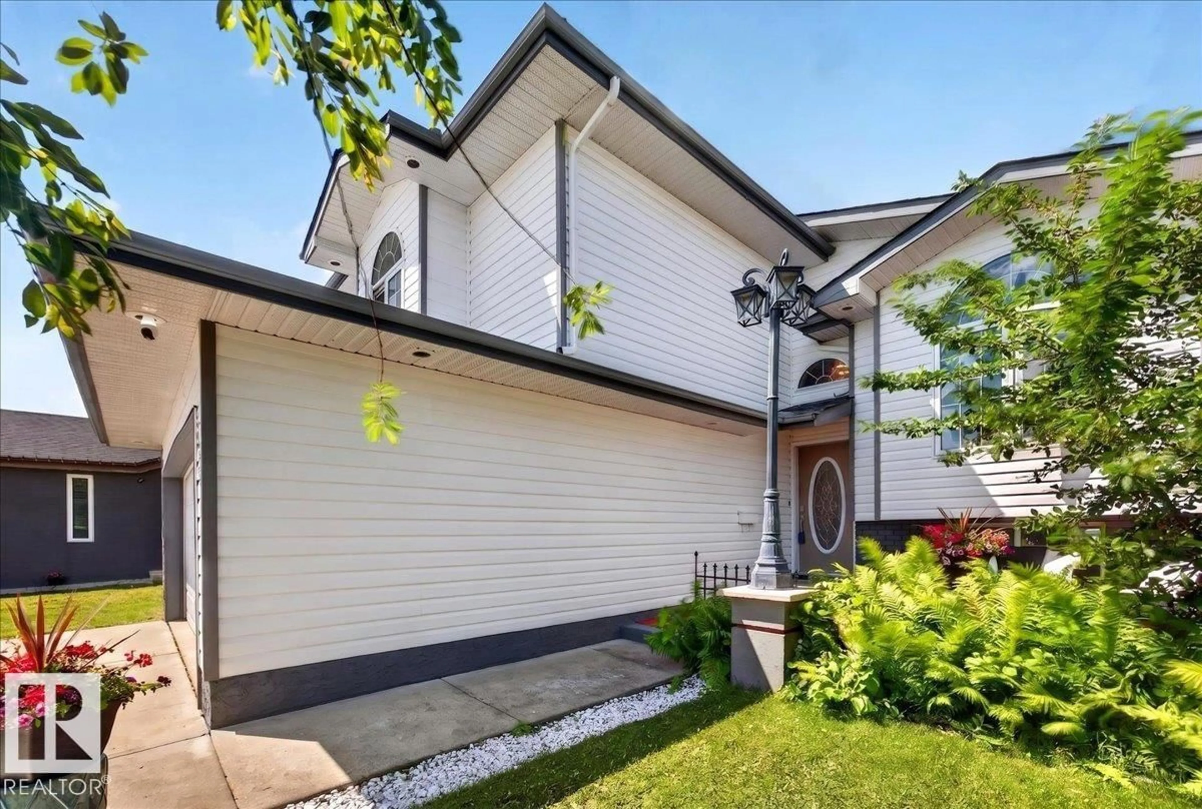 Home with brick exterior material, street for 5120 157 AV, Edmonton Alberta T5Y2X5