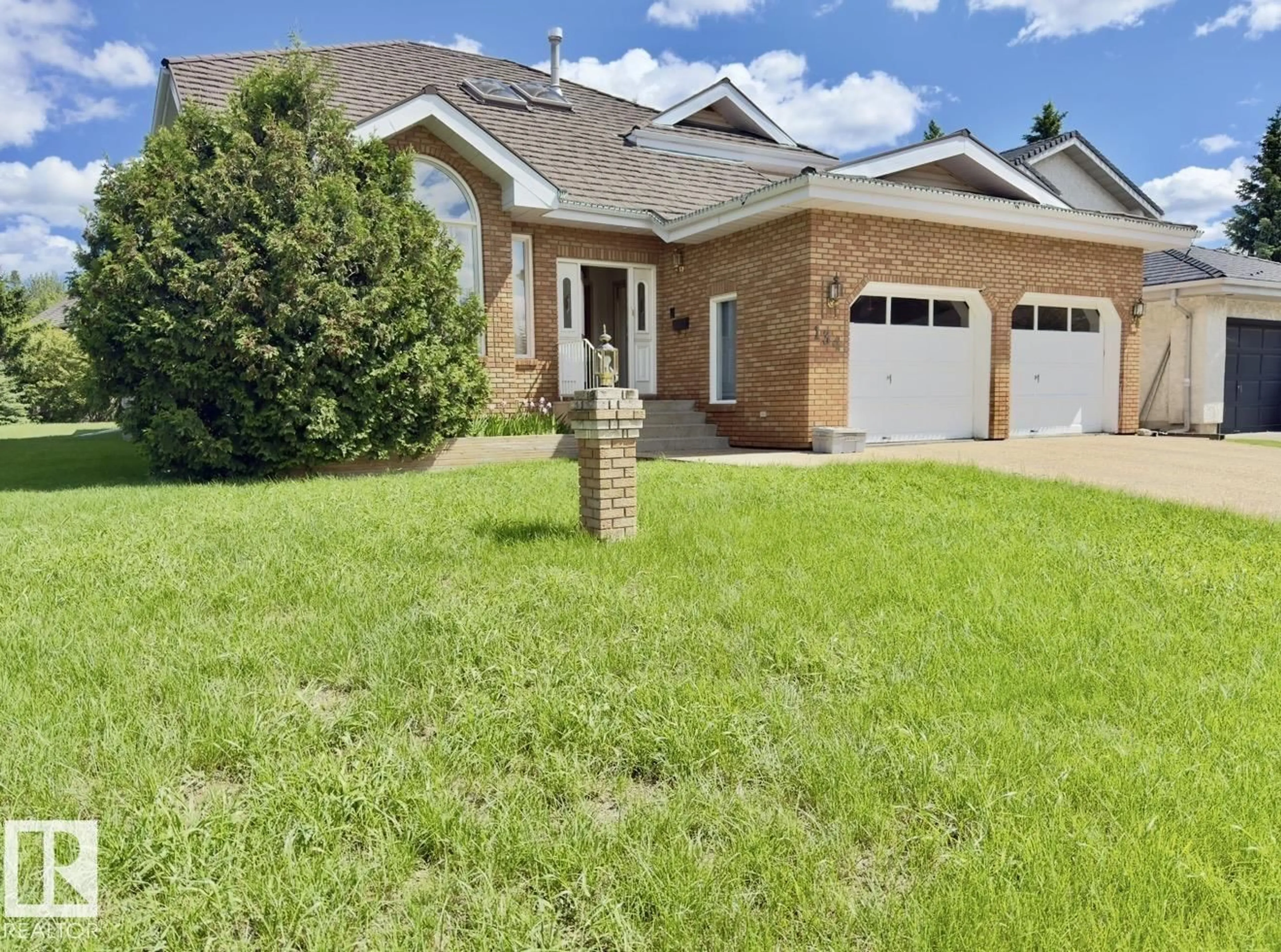 Home with brick exterior material, street for 134 WOLF RIDGE PL, Edmonton Alberta T5T5N2