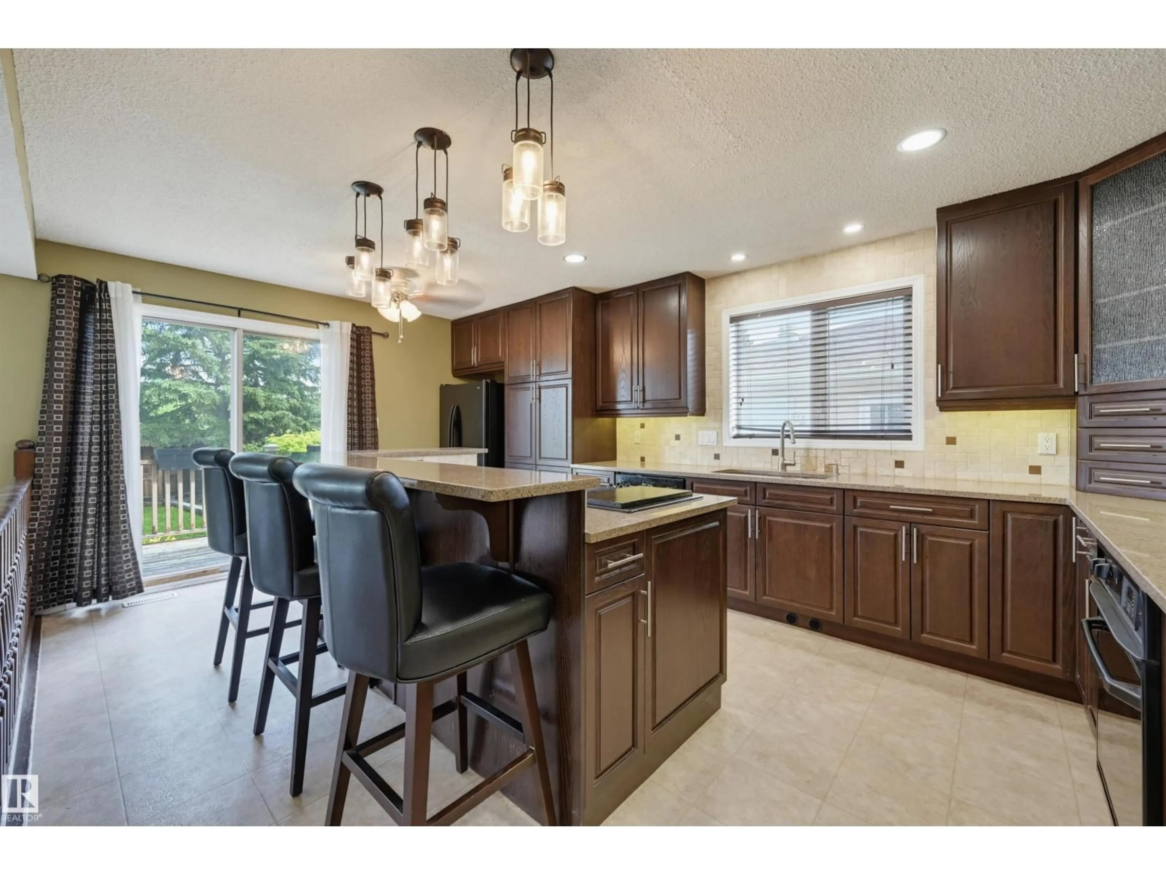 Open concept kitchen, unknown for 3211 104 ST, Edmonton Alberta T6J3N5