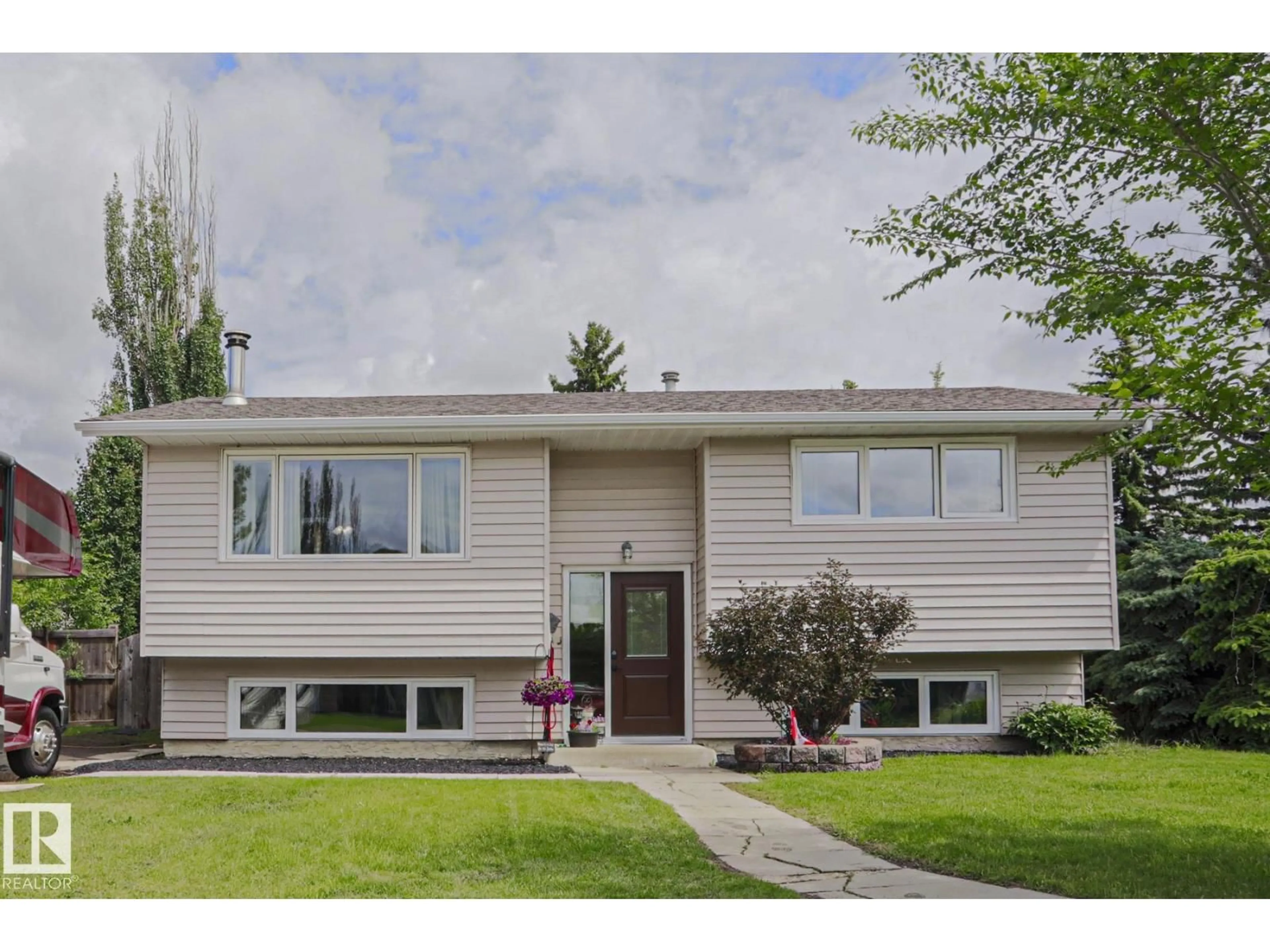 Home with vinyl exterior material, street for NW - 2007 67 ST, Edmonton Alberta T6K2H7