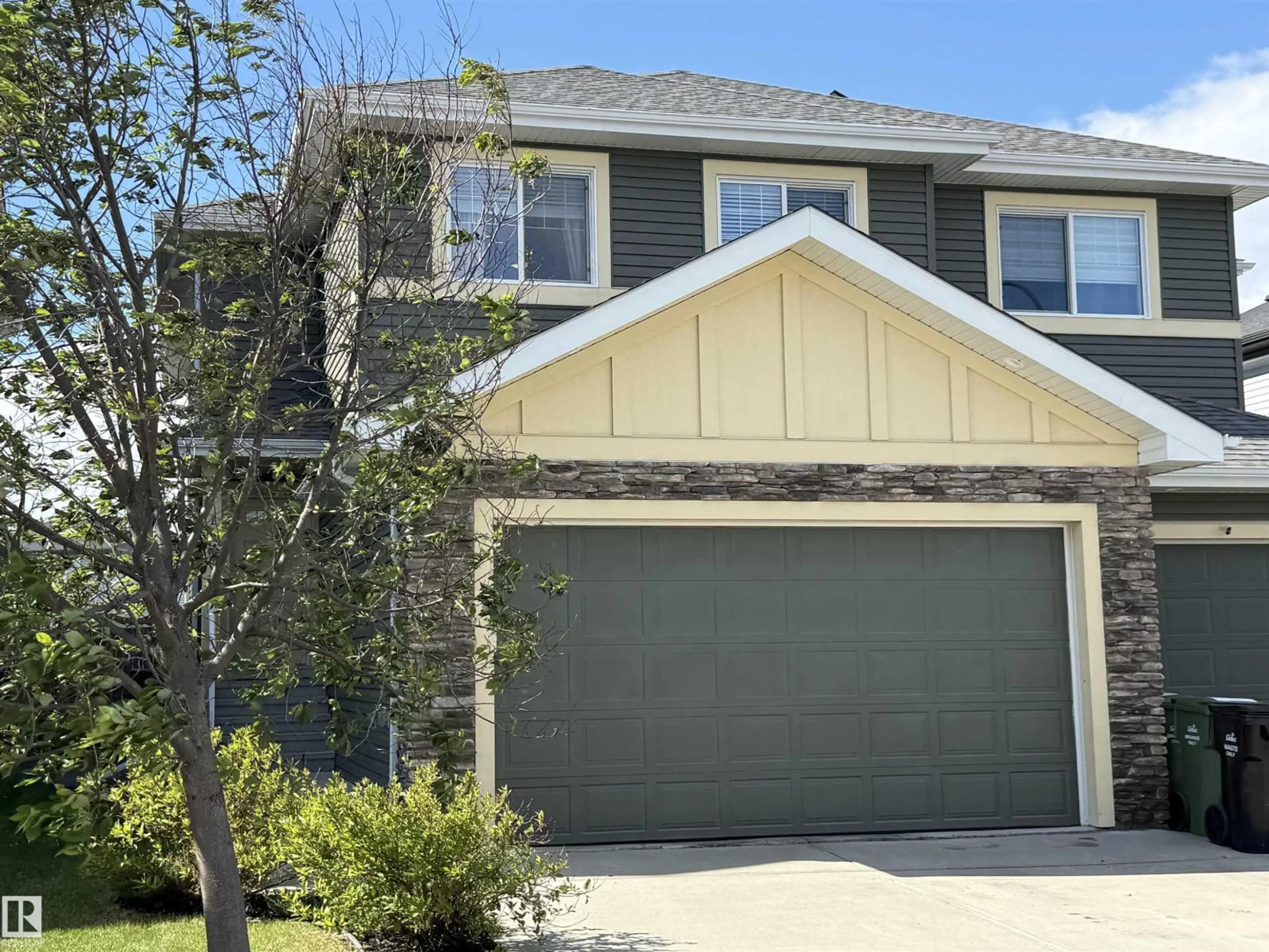 Home with vinyl exterior material, street for 189 REED PL, Leduc Alberta T9E0S6