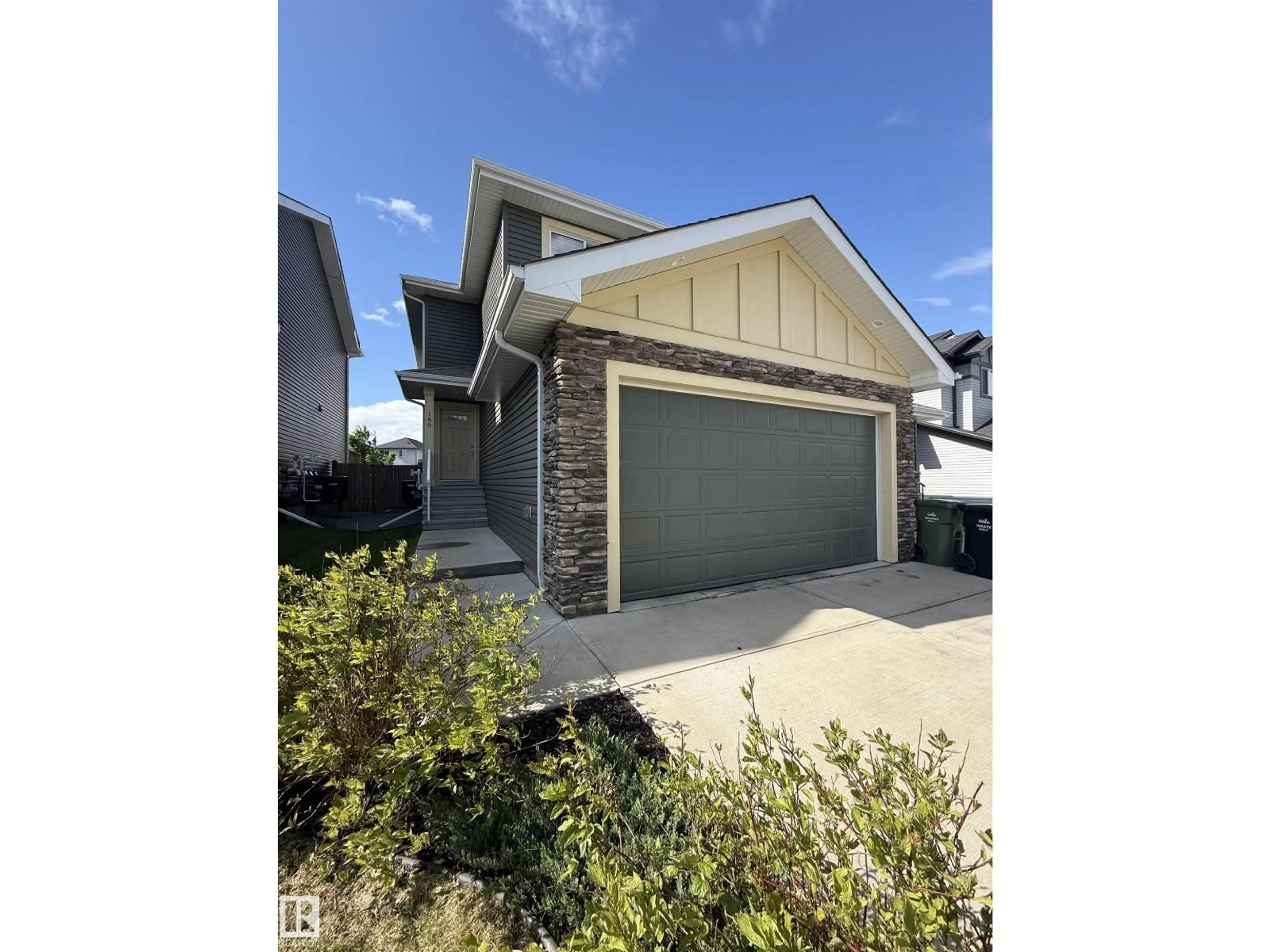 Home with vinyl exterior material, street for 189 REED PL, Leduc Alberta T9E0S6