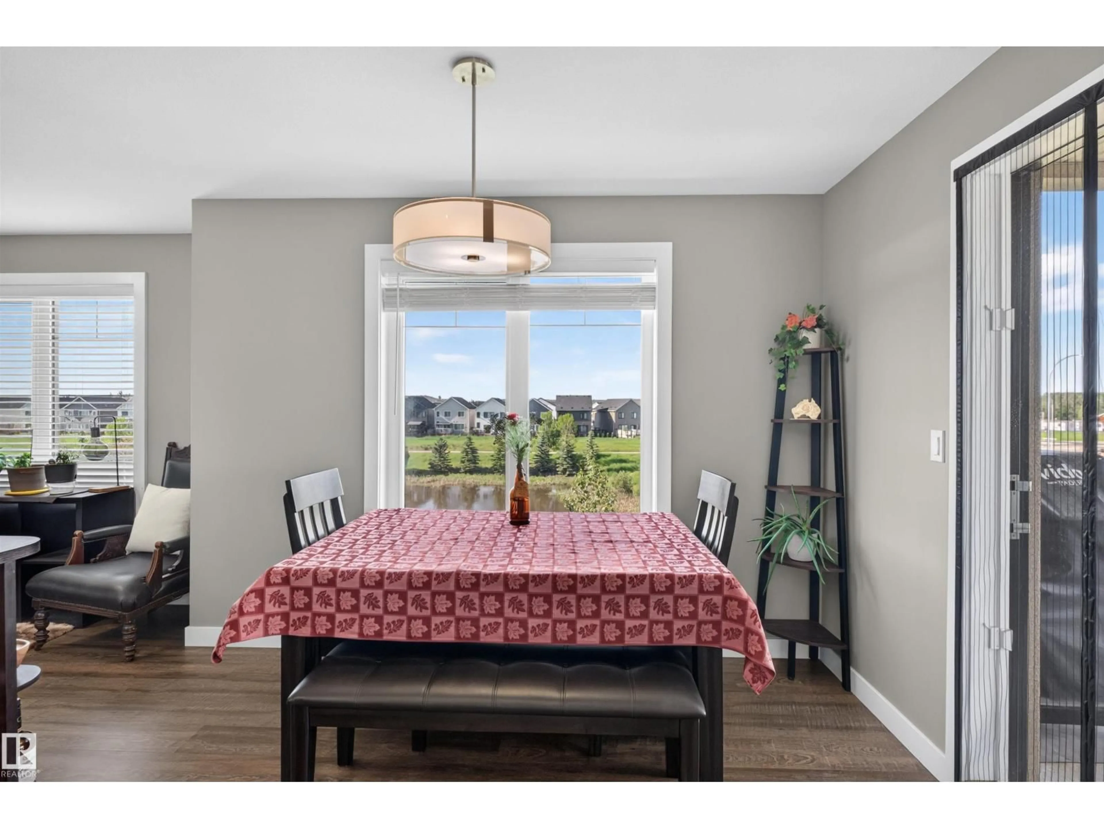 Dining room, wood/laminate floor for #307 - 1029 173 ST, Edmonton Alberta T6W3E4