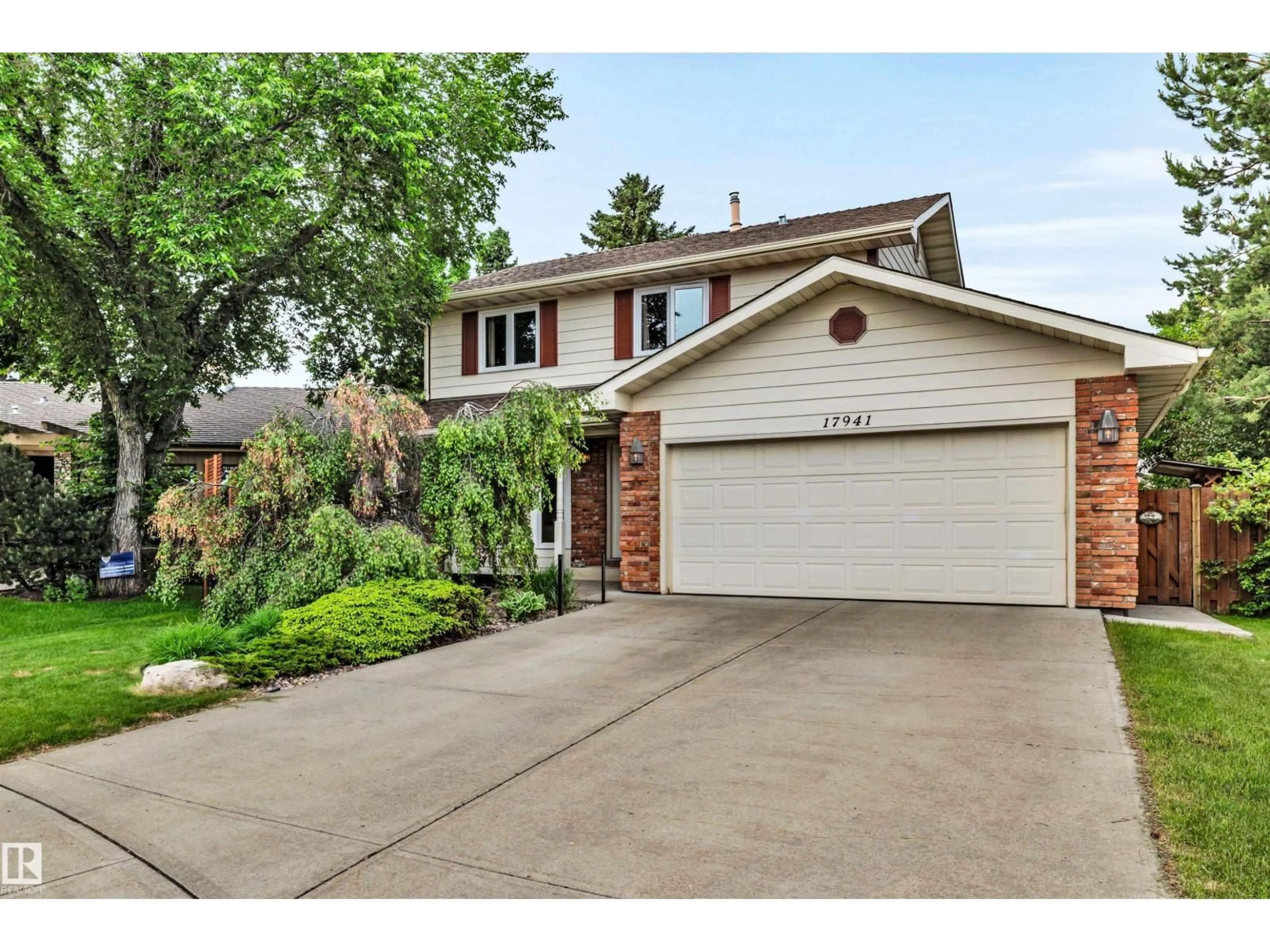 Home with brick exterior material, street for NW - 17941 57 AV, Edmonton Alberta T6M1X6