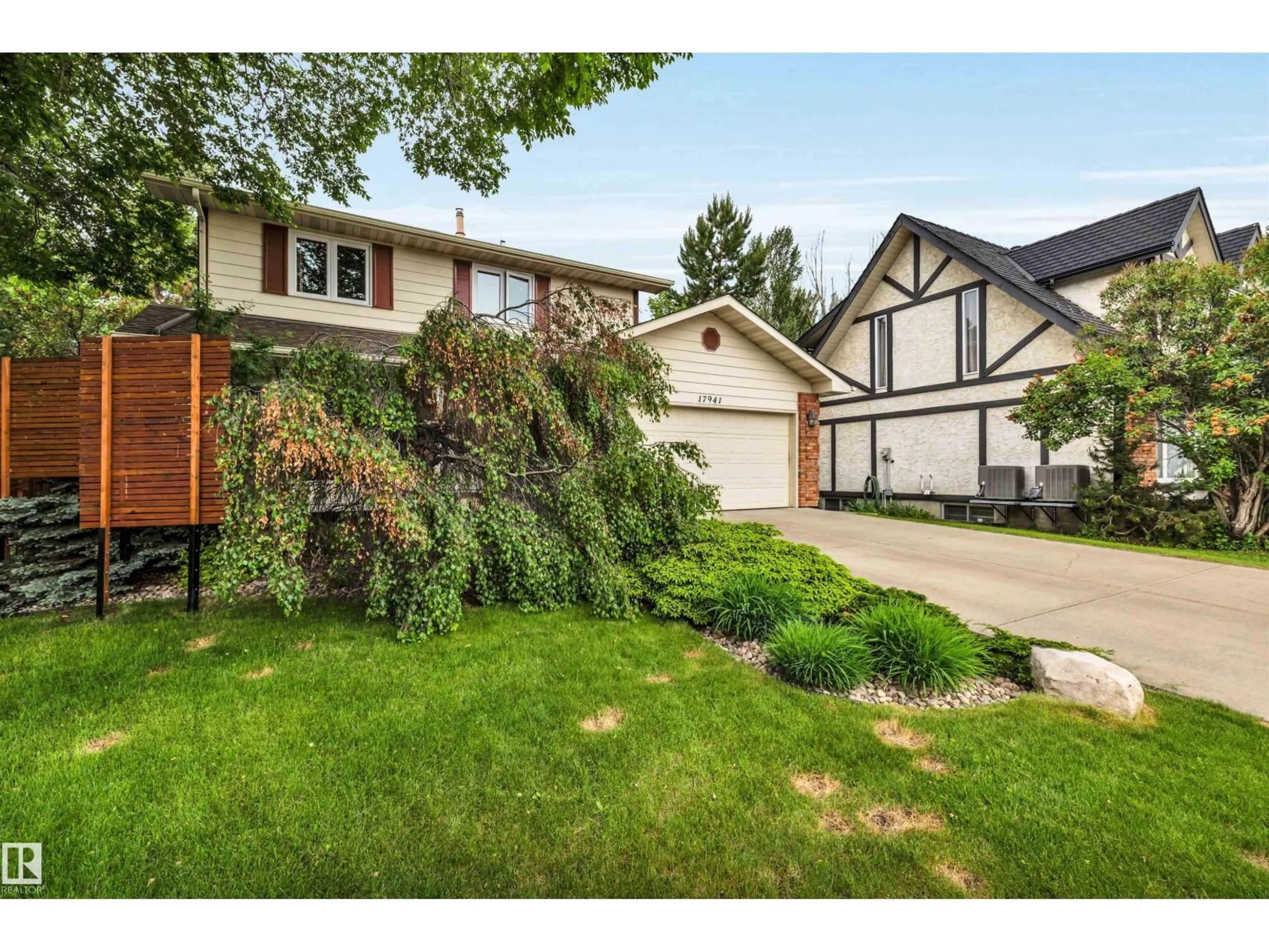 Home with vinyl exterior material, street for NW - 17941 57 AV, Edmonton Alberta T6M1X6