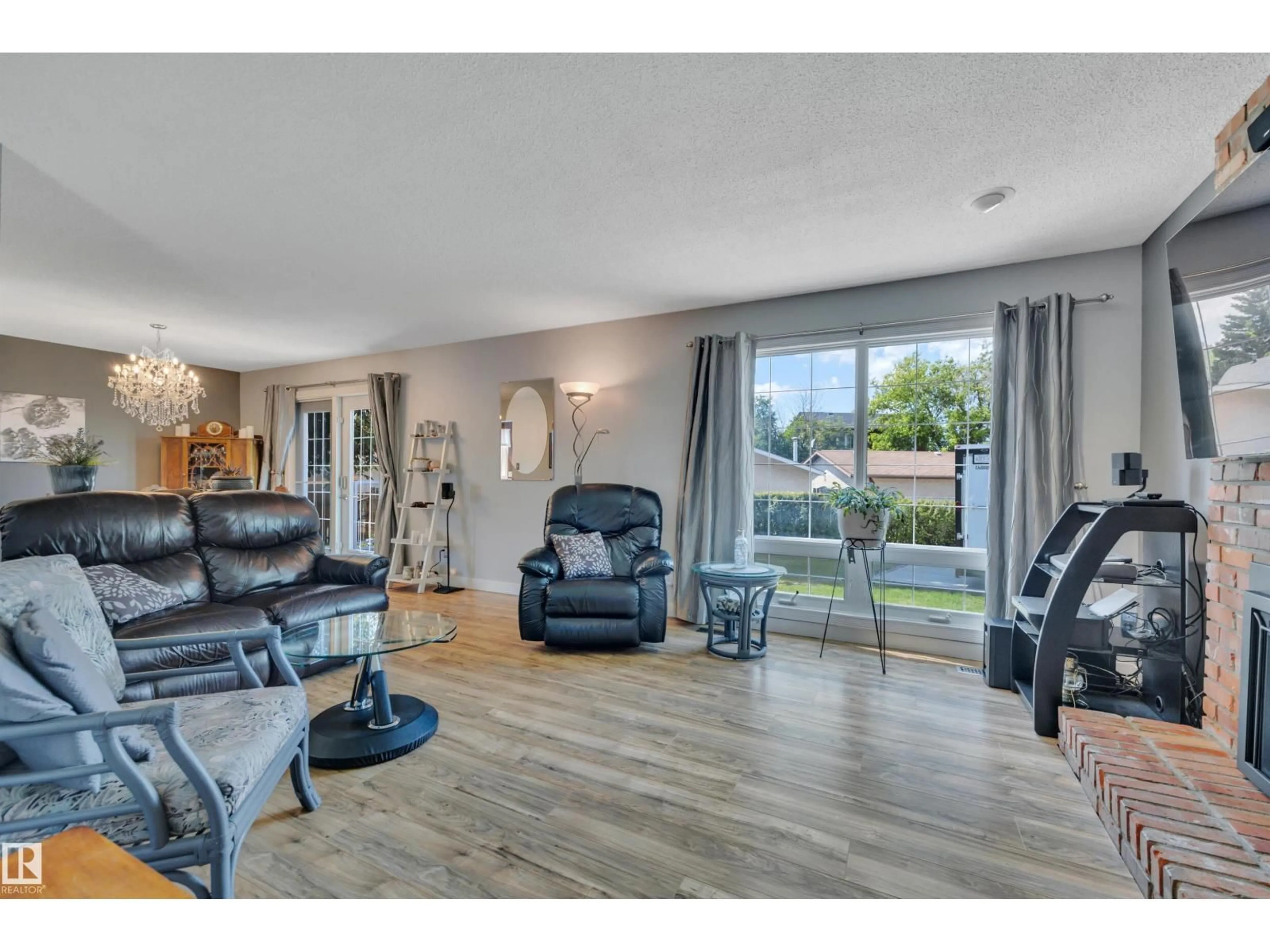 Living room with furniture, unknown for NW - 14032 116 ST, Edmonton Alberta T5X3N9