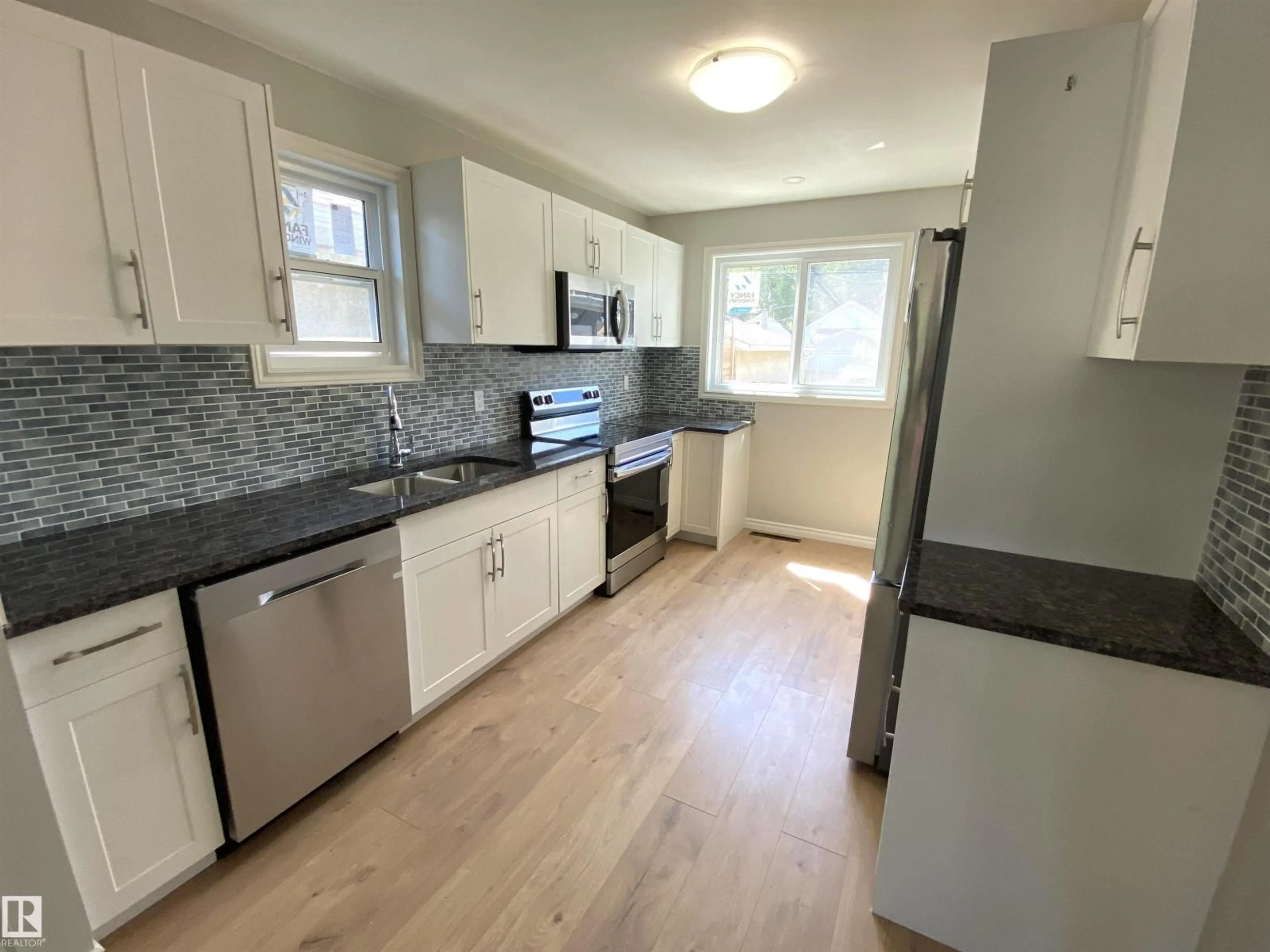 Standard kitchen, wood/laminate floor for NW - 12010 66 ST, Edmonton Alberta T5B1J6