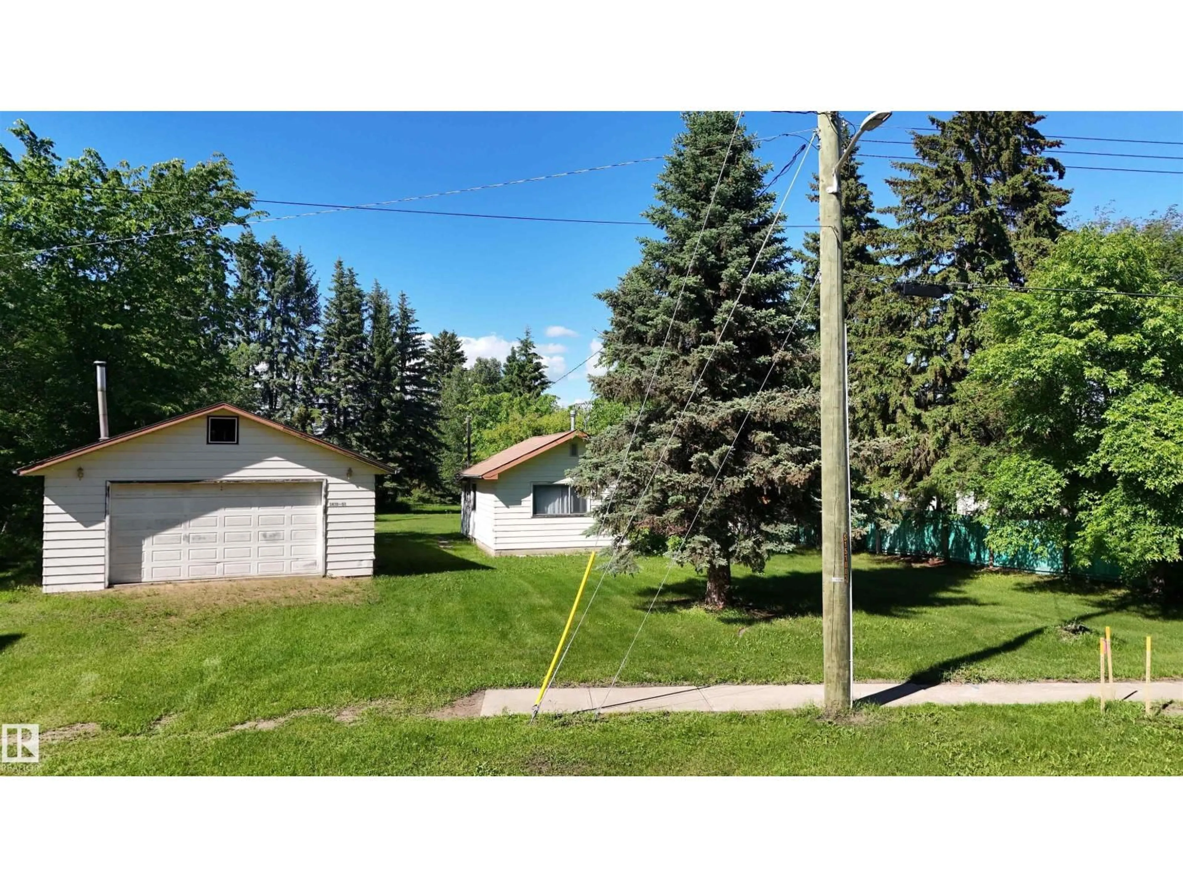 A pic from outside/outdoor area/front of a property/back of a property/a pic from drone, street for 5416 51 AV, Andrew Alberta T0B0C0