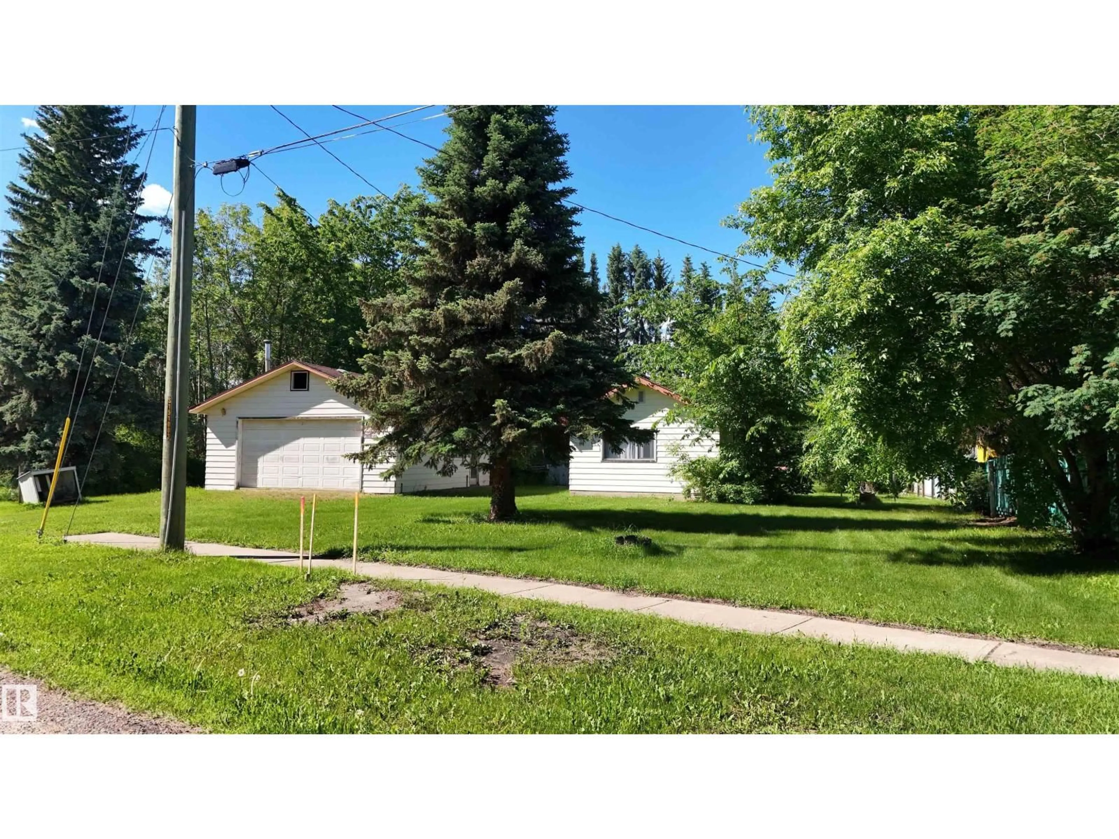 A pic from outside/outdoor area/front of a property/back of a property/a pic from drone, street for 5416 51 AV, Andrew Alberta T0B0C0