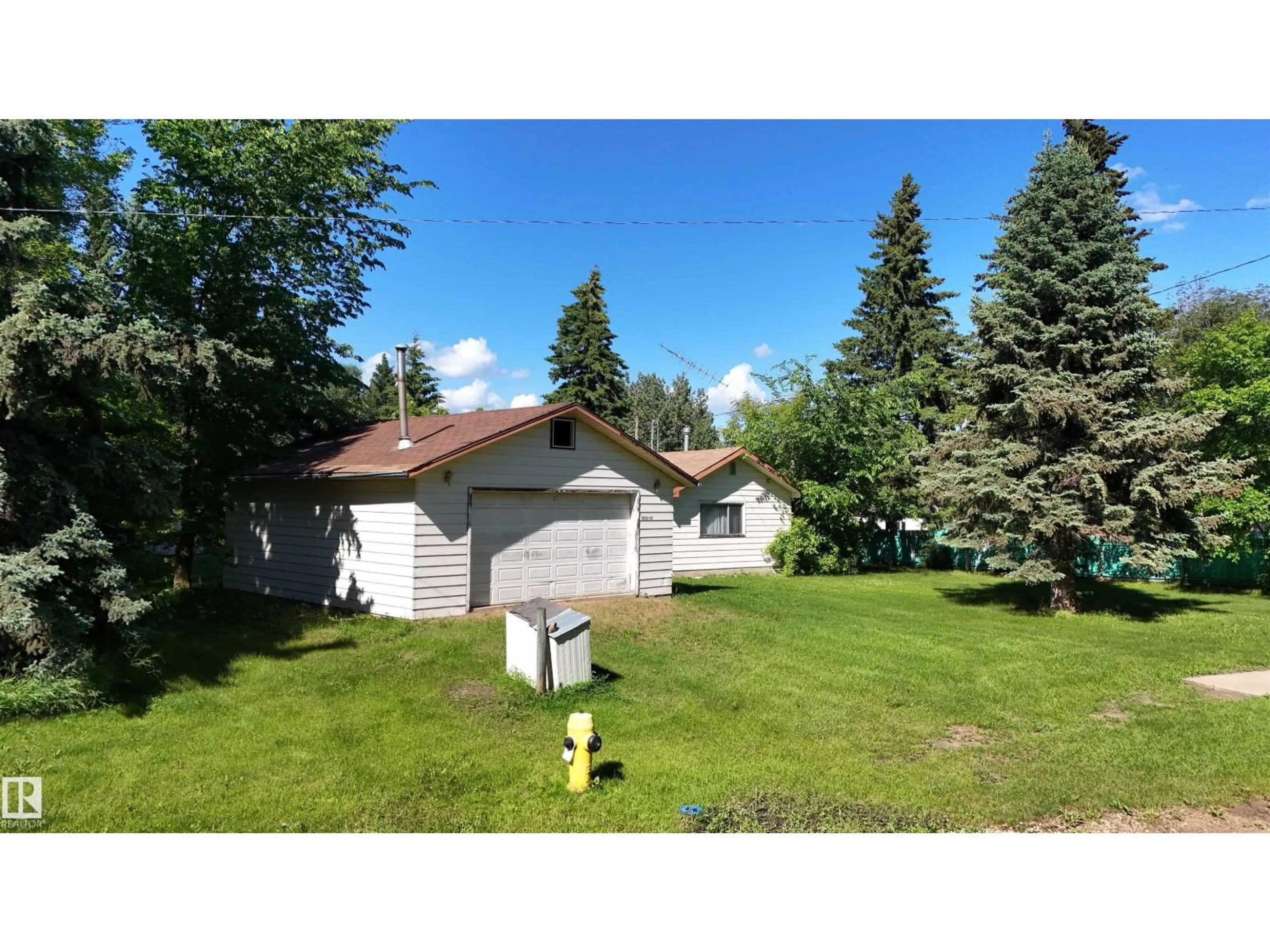 A pic from outside/outdoor area/front of a property/back of a property/a pic from drone, street for 5416 51 AV, Andrew Alberta T0B0C0