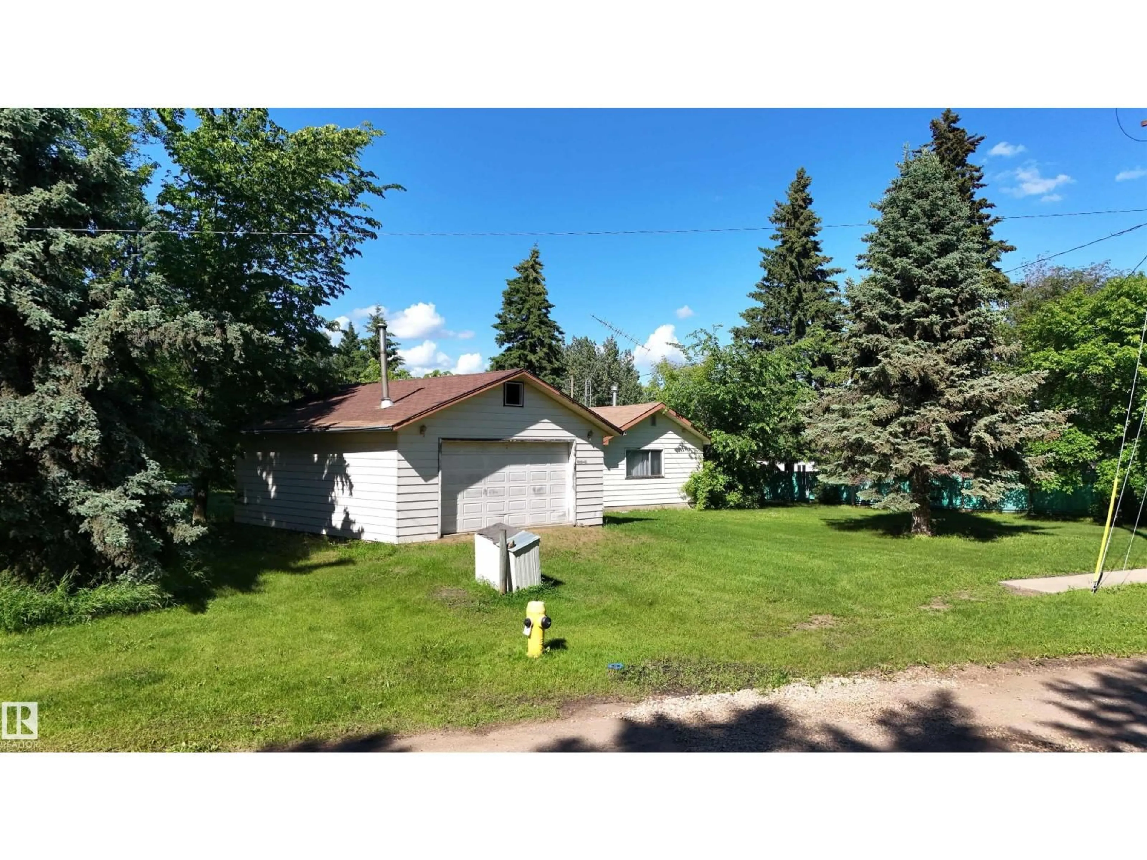 A pic from outside/outdoor area/front of a property/back of a property/a pic from drone, street for 5416 51 AV, Andrew Alberta T0B0C0