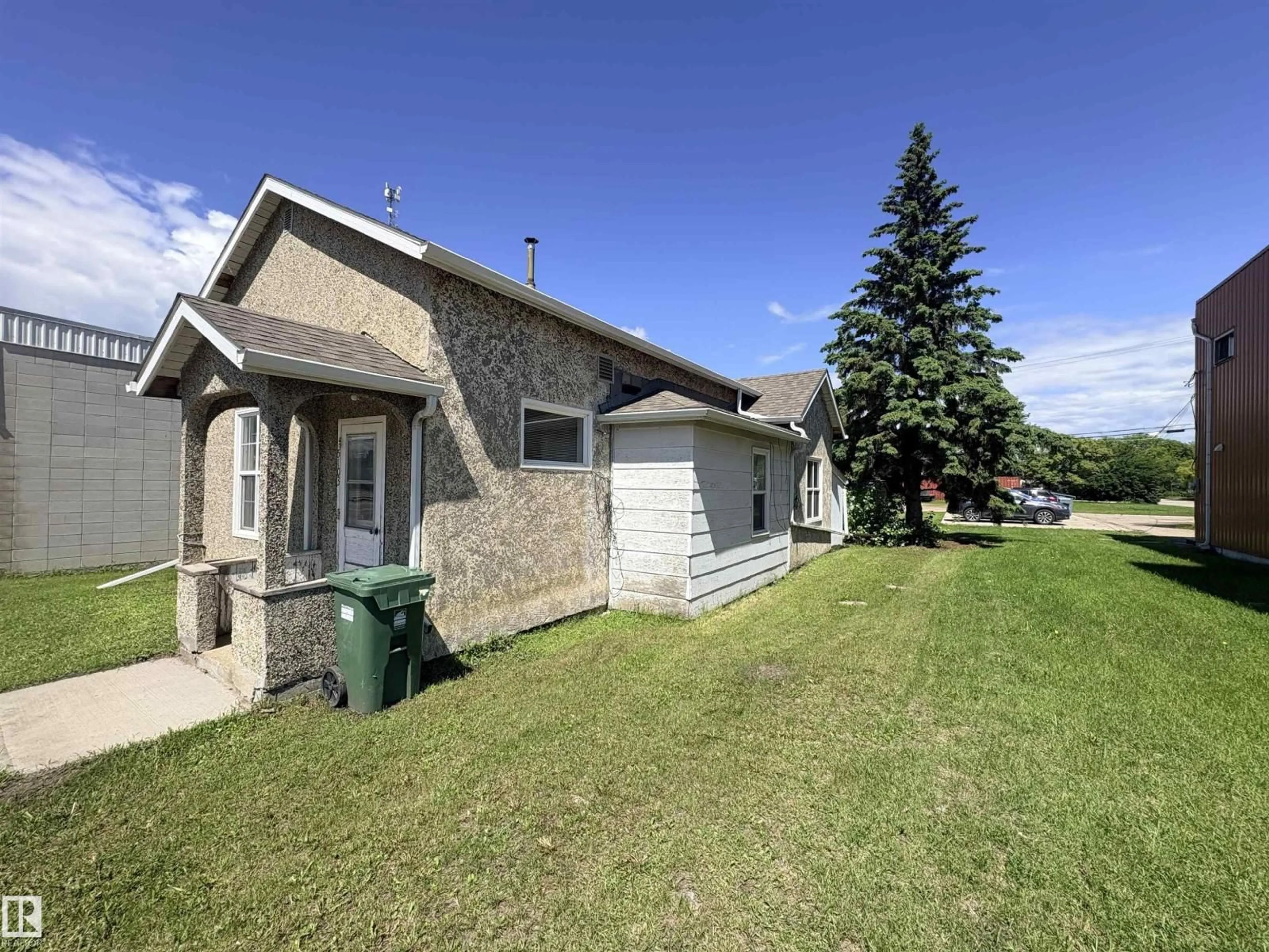 A pic from outside/outdoor area/front of a property/back of a property/a pic from drone, unknown for 5103 50 AV, Bonnyville Town Alberta T9N2G9