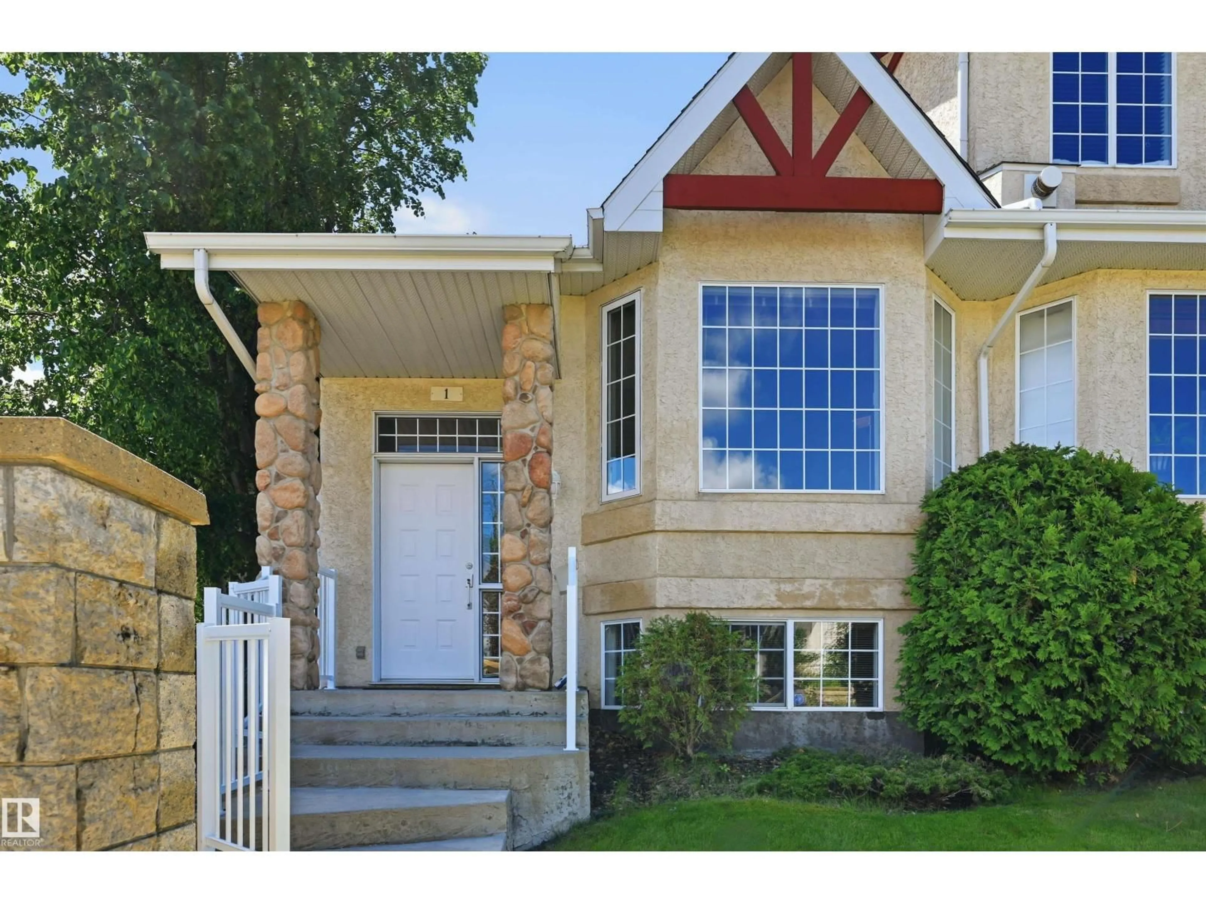 Home with vinyl exterior material, street for 303 LEGER WY, Edmonton Alberta T6R2X9