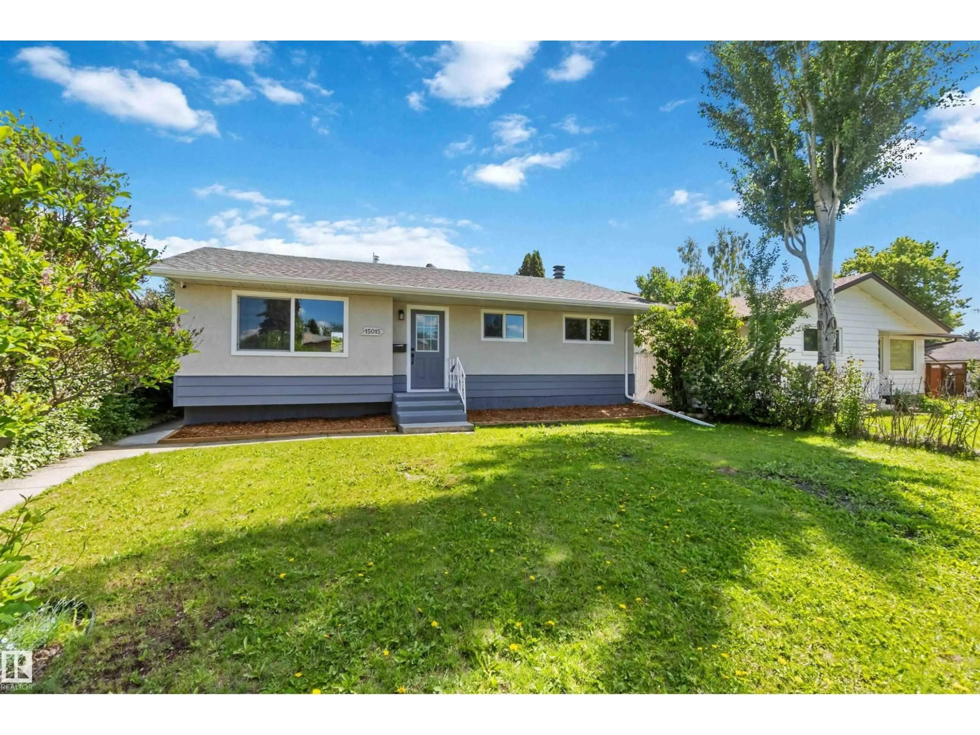 Home with vinyl exterior material, street for NW - 15015 95 ST, Edmonton Alberta T5E3Z3