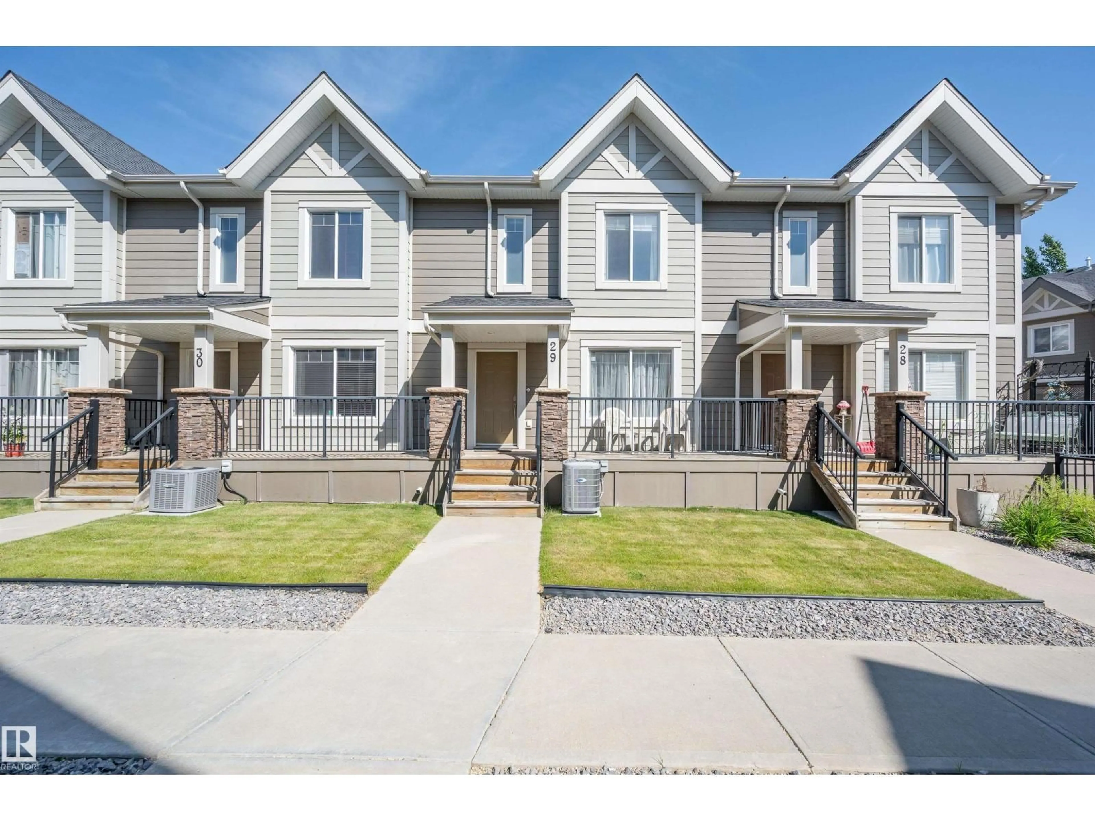 A pic from outside/outdoor area/front of a property/back of a property/a pic from drone, street for 1150 - 29 WINDERMERE WY, Edmonton Alberta T6W2B6