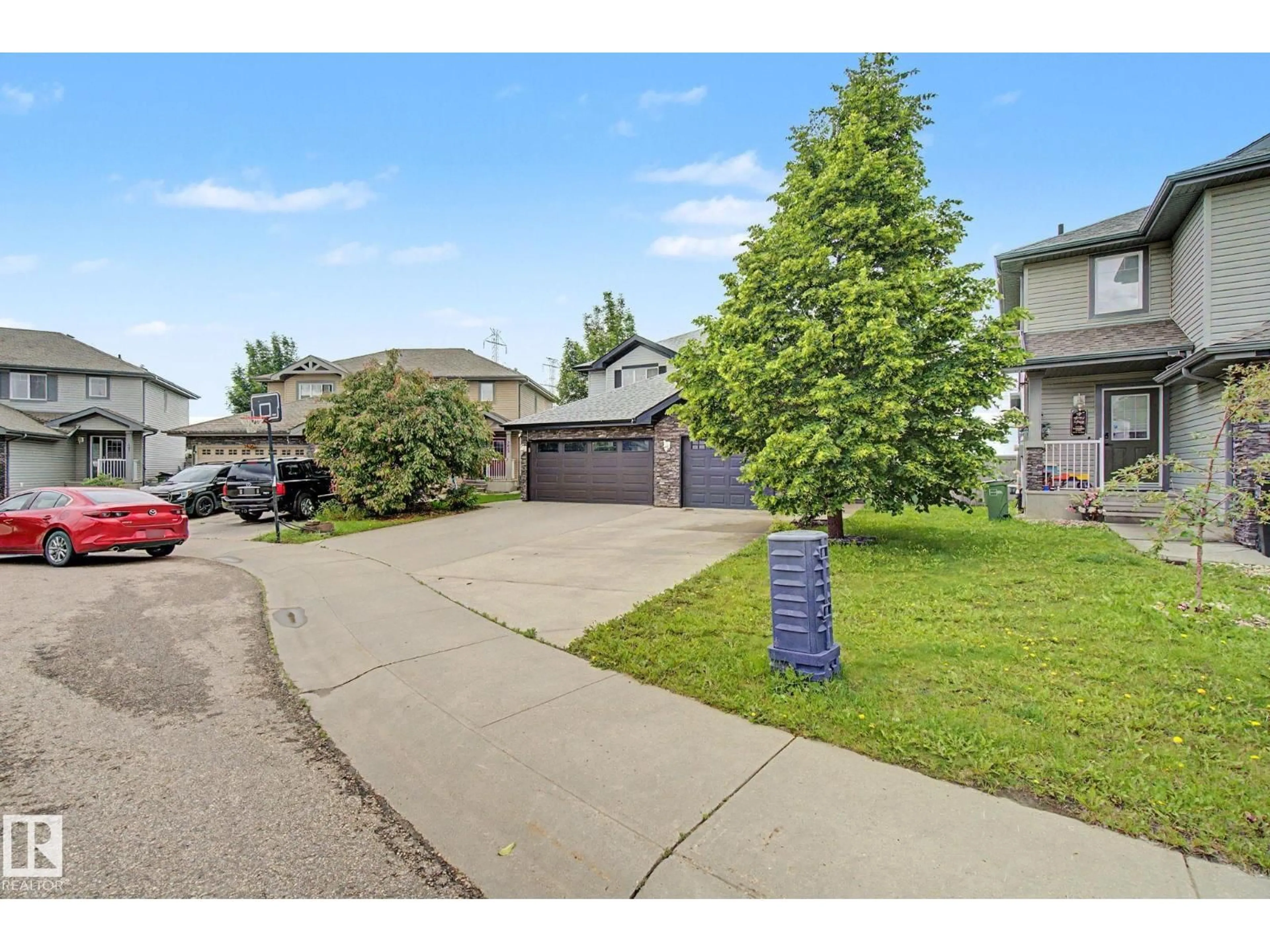 A pic from outside/outdoor area/front of a property/back of a property/a pic from drone, street for SW - 5628 1A AV, Edmonton Alberta T6X0K9